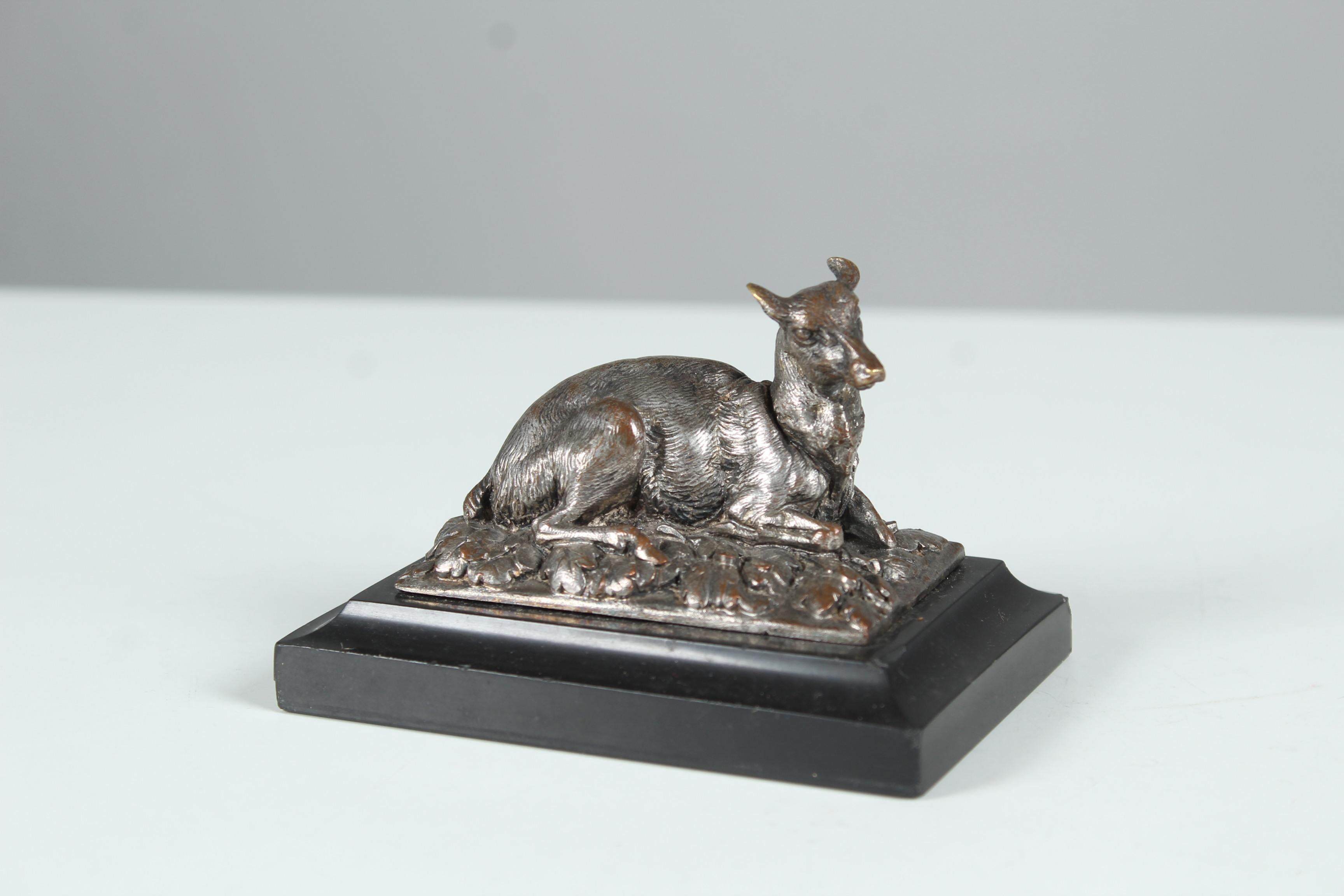 Beautiful antique silvered bronze work on a black stone base.
Finely chiseled and natuarally depicted.
France, circa 1880.



