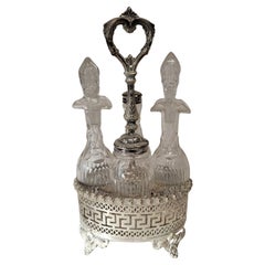 Antique Silverplate and Crystal Four Bottle Cruet Set