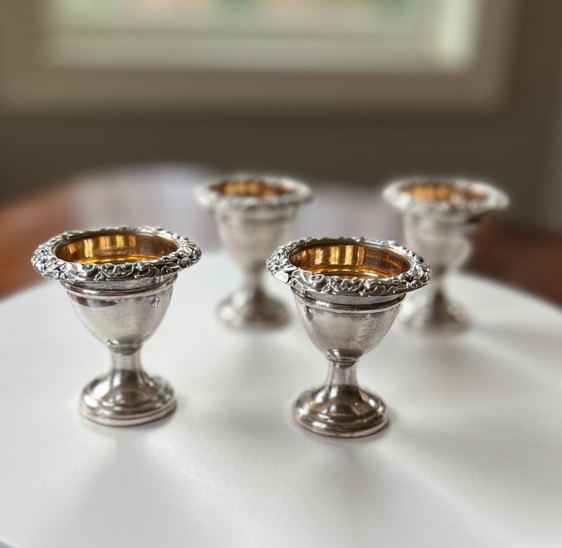 Four early 20th c.antique silverplate and gilt egg cups. These have a nice heft to them with a combined weight of 1lb. Whether in use or on a sideboard, these lovely egg cups are visually attractive. What a lovely way to begin your