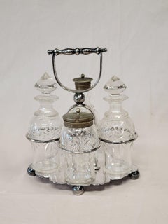 Antique Silverplate and Glass Four Bottle Cruet Set