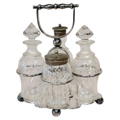 Antique Silverplate and Glass Four Bottle Cruet Set