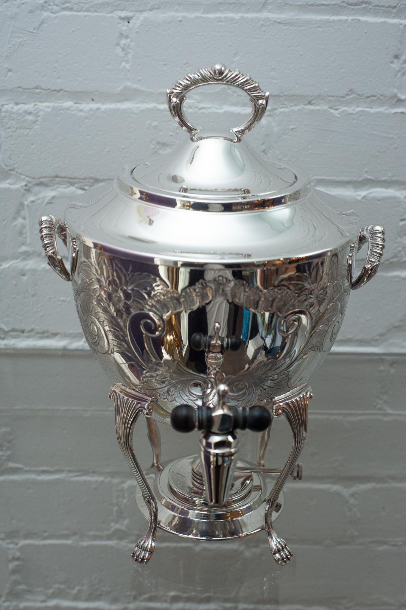 A stunning and large Silver-plate samovar / drink cask in silver-plate copper, made in Canada.