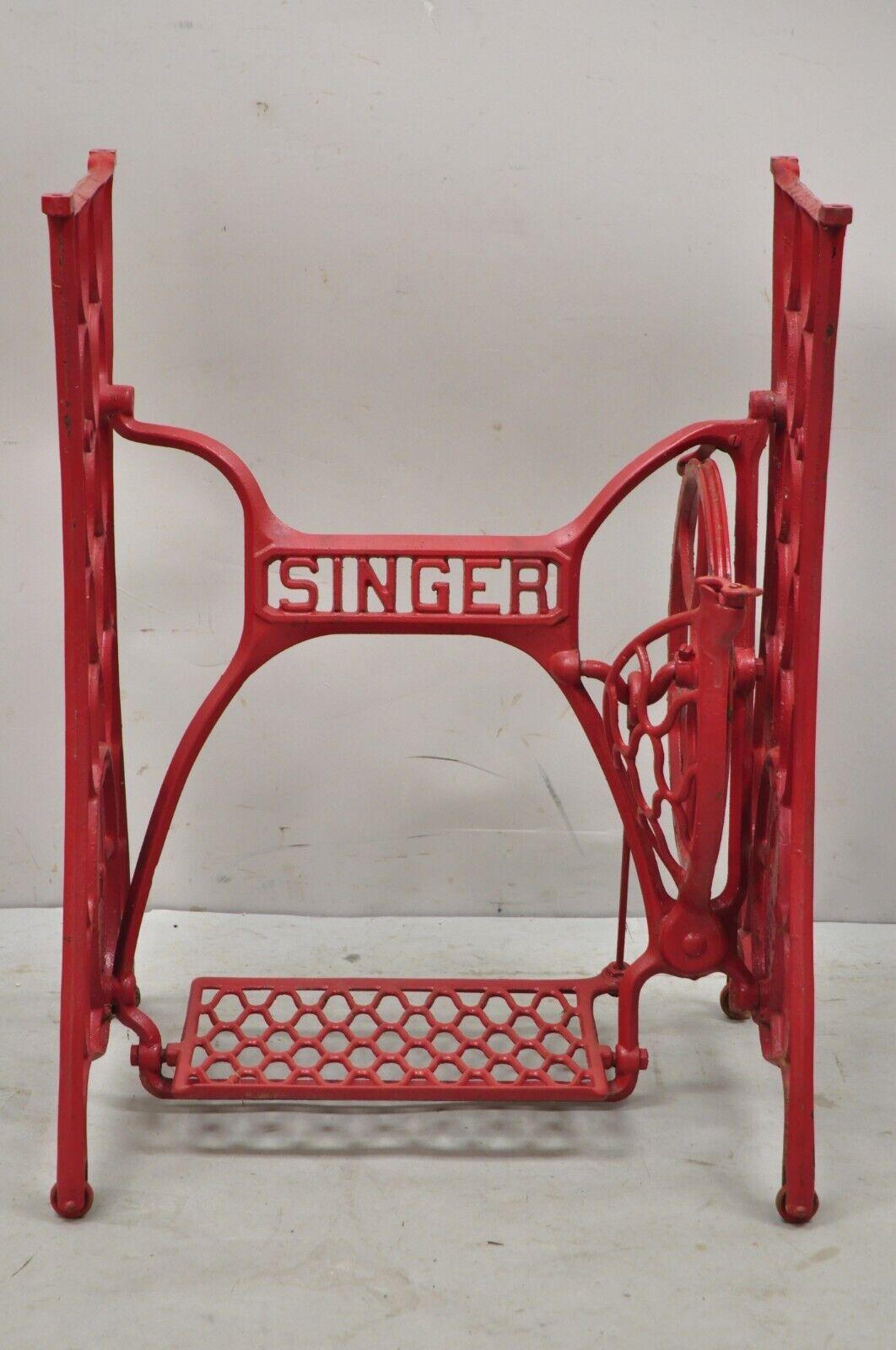 Antique Singer Cast Iron Red Treadle Sewing Machine Base. Item features a cast iron construction, original label, very nice vintage item, quality American craftsmanship, great to add a top. Paint is not original and appears to be a later addition.