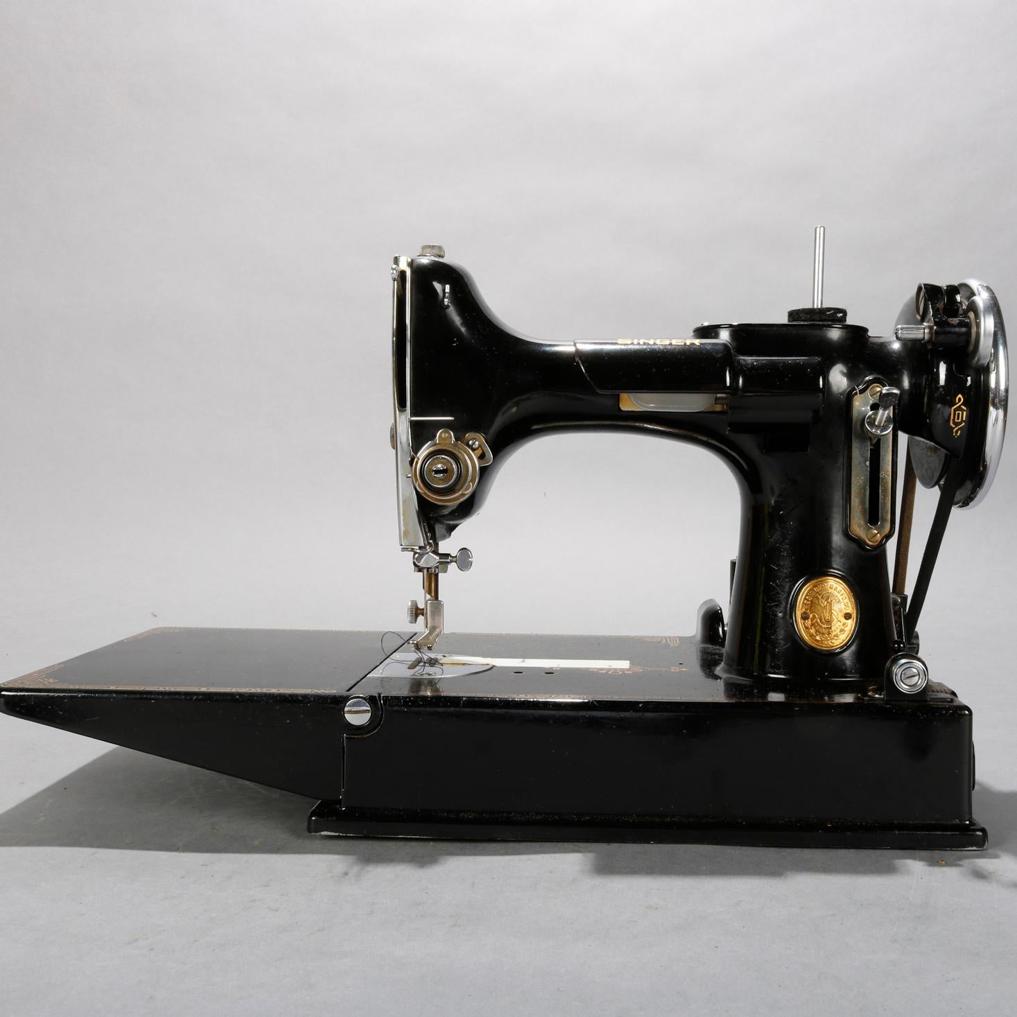 vintage portable singer sewing machine with case