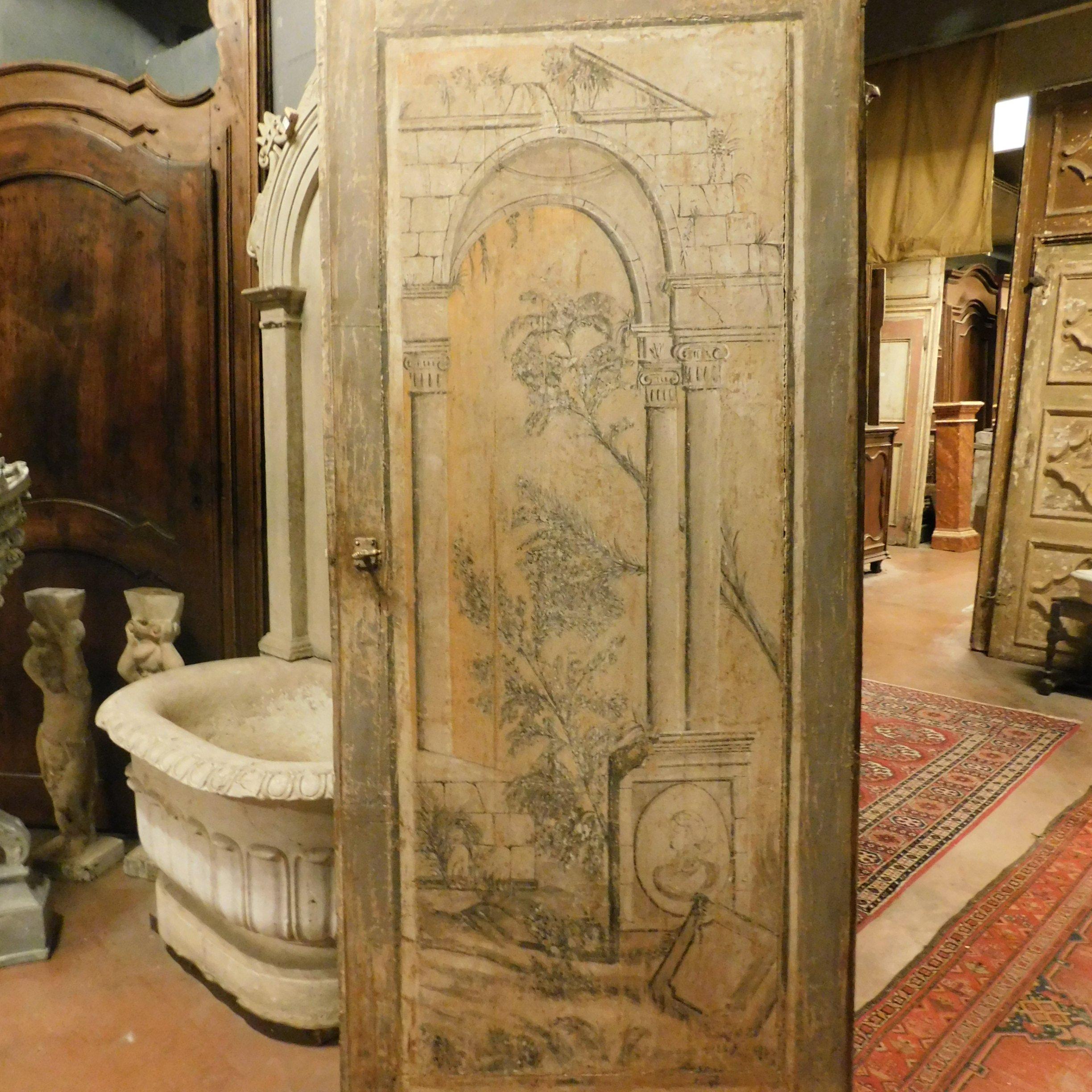 Antique door painted with Classic landscape, back painted simple but painted in monochrome with panel design, without frame, built and hand painted in the 17th century, coming from a palace in central Italy.
Ideal to embellish any of your