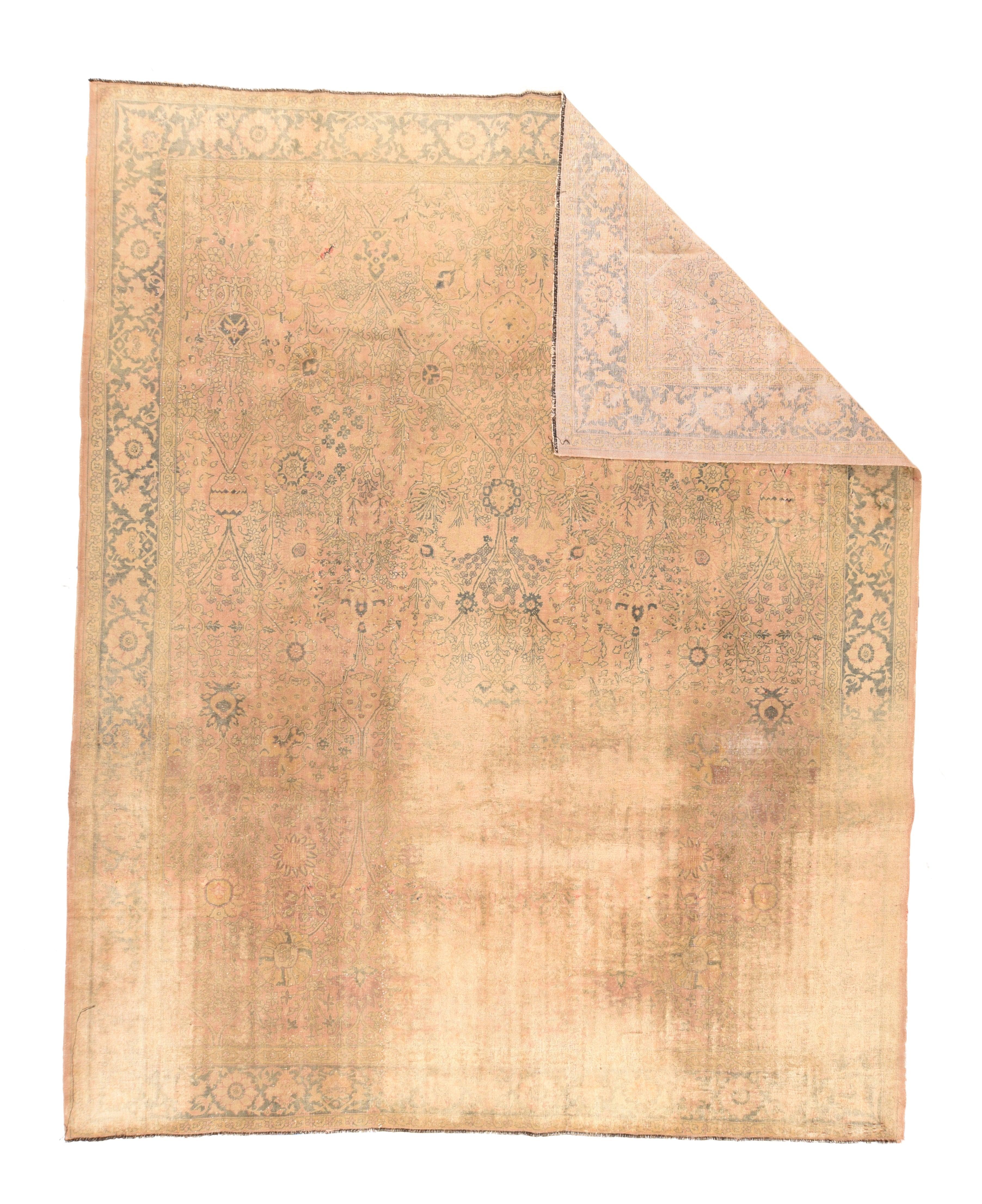 Antique Sivas Distress Look Rug 8'1'' x 10'5''.  This vintage piece has been treated to subdue the colors and reduce the pattern, resulting in a partial light blue rosette border and flickering 