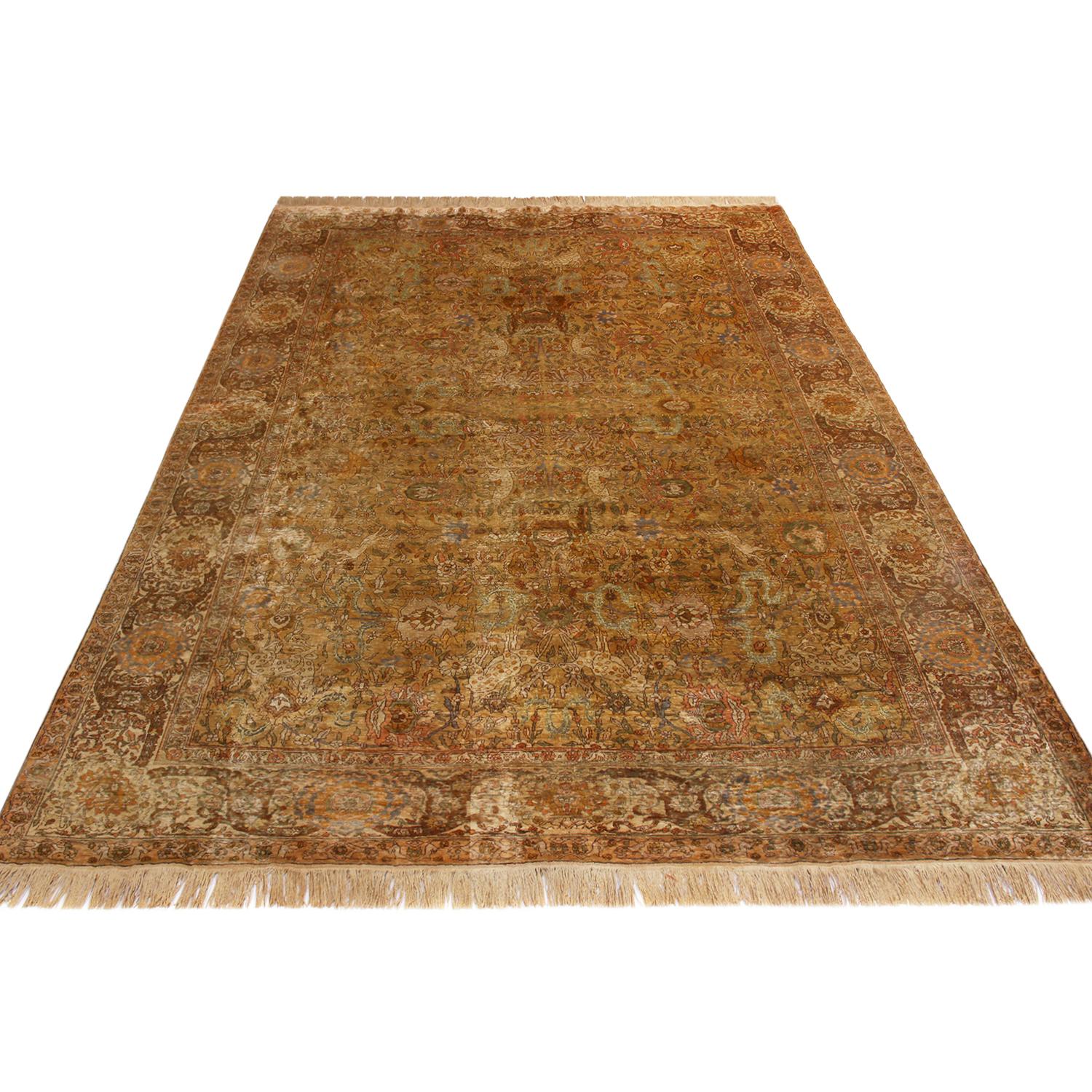 Originating from Turkey between 1890-1900, this antique Sivas rug enjoys both hand knotted, naturally luminous silk and an uncommon variety of naturalist patterns, including especially rare deer and stag symbols widely believed to symbolize change