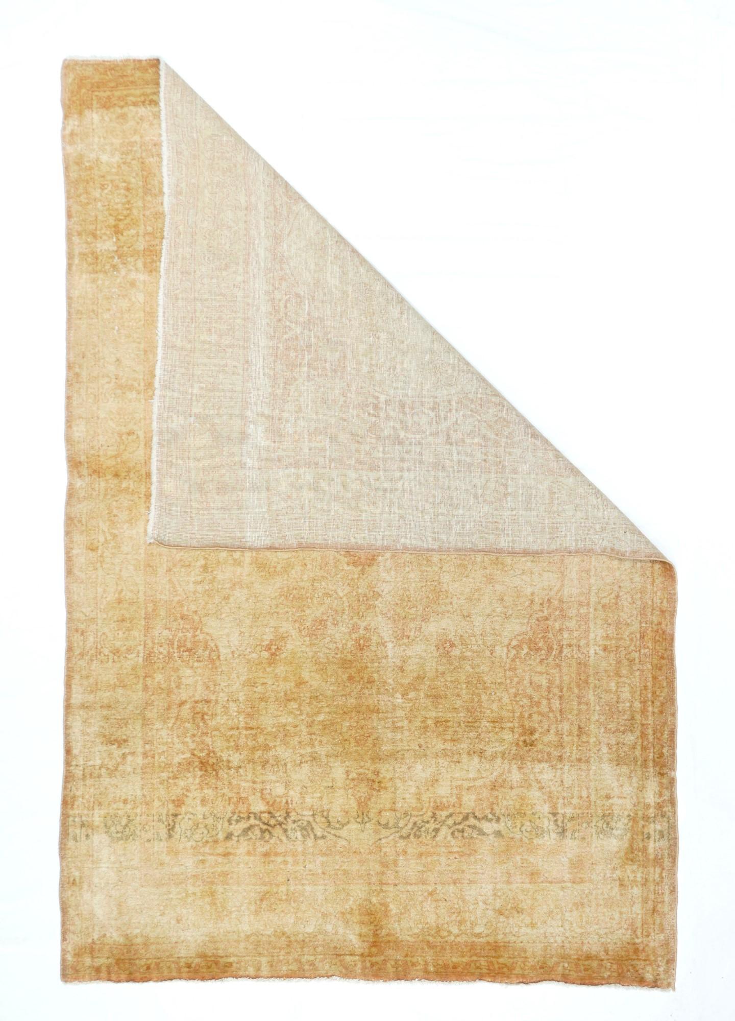 Abrash tells the dominant tale on this good condition restricted light palette eastern Turkish [if it’s a Sivas] scatter. The generally subdued palette works straw, sand, golden brown and other brown shades into a subtle medallion pattern with