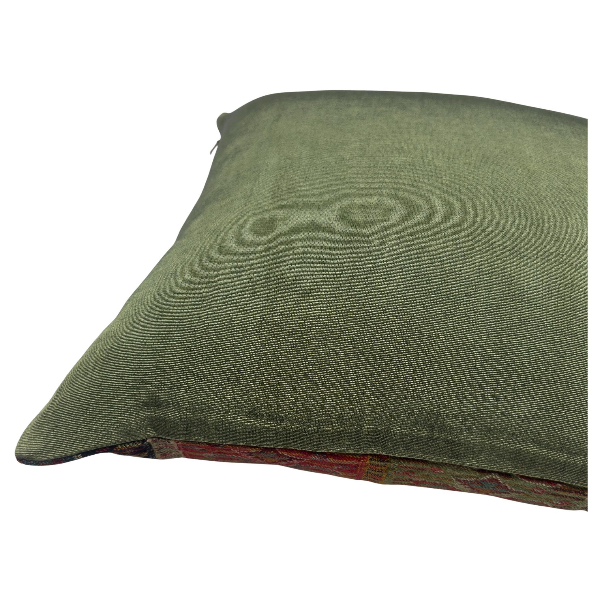 Crafted from antique handwoven wool once used as waistbands in regional women’s attire, these covers offer a rare glimpse into the sartorial traditions of Sivas, an Anatolian region of Turkey. The vertical striping in earthy reds, creams, and deep