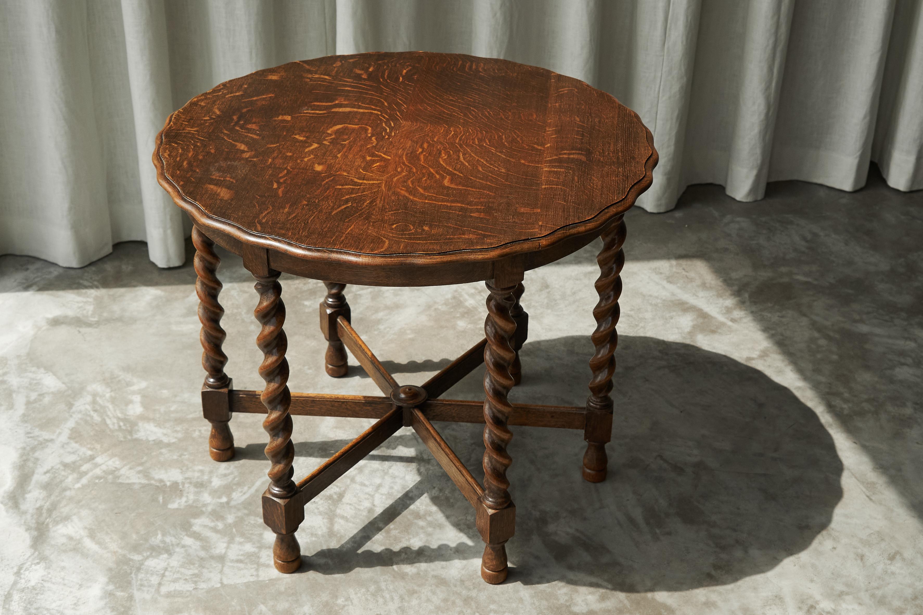 Antique Six Legged Side Table in Expressive Oak with Scalloped Top

This is a wonderful antique six legged side or gueridon table in expressive solid and turned oak with a scalloped top, made in the late 19th century. 

A great and sophisticated