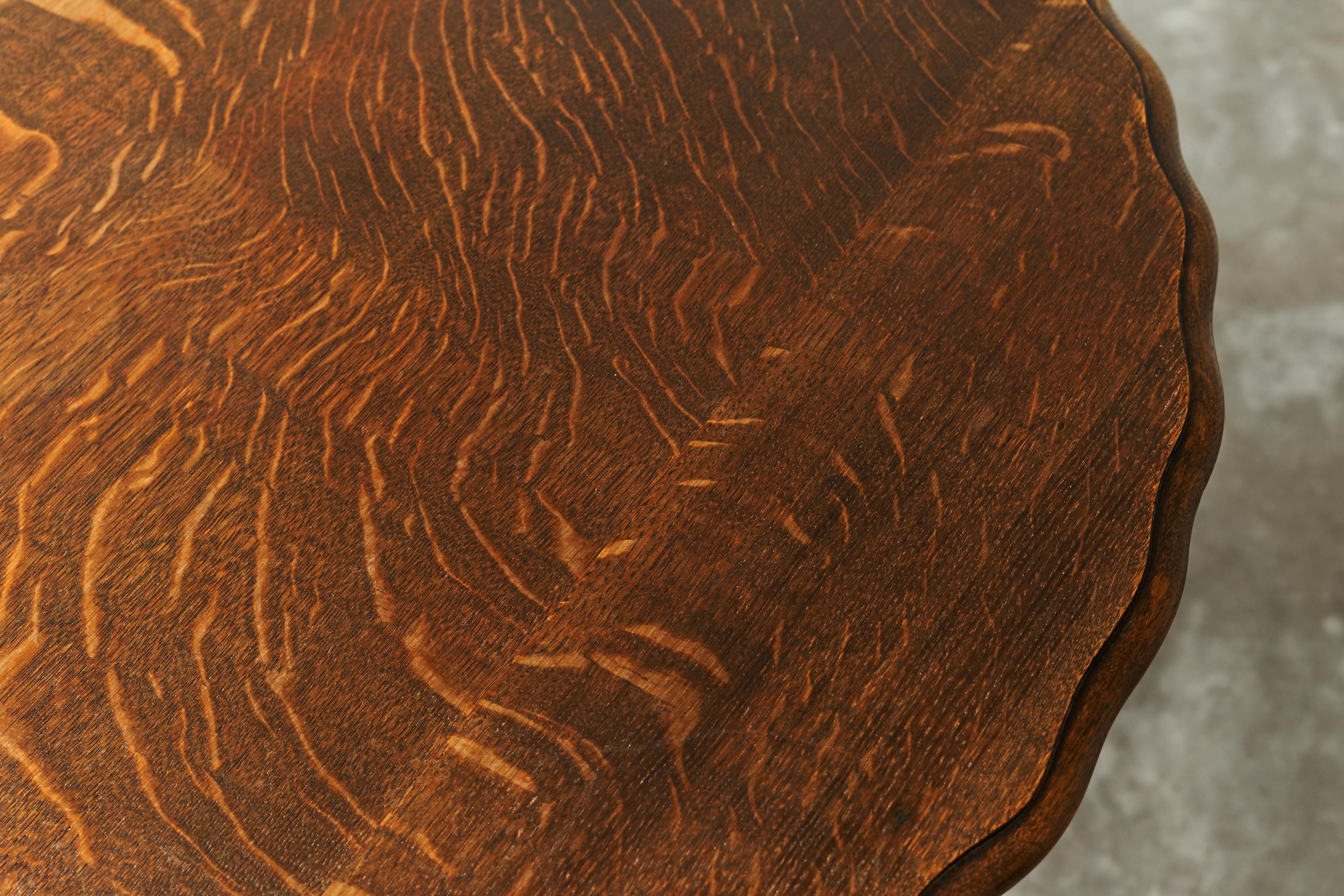European Antique Six Legged Side or Gueridon Table in Expressive Oak with Scalloped Top