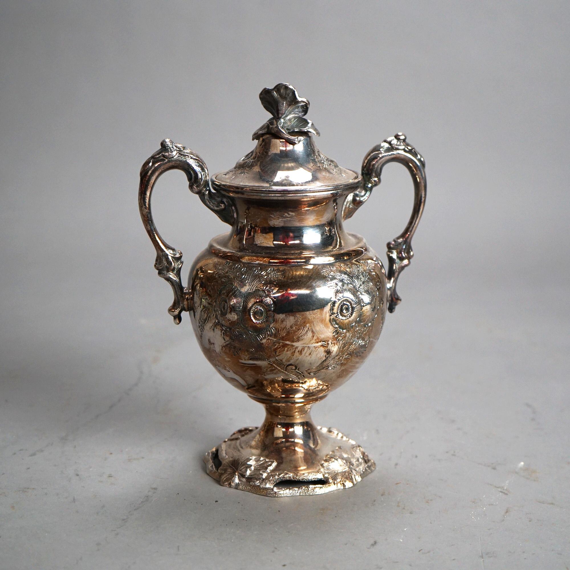 Antiguo Juego de Té de Seis Piezas Plateado con Grabado Floral C1890

Medidas - 12,5