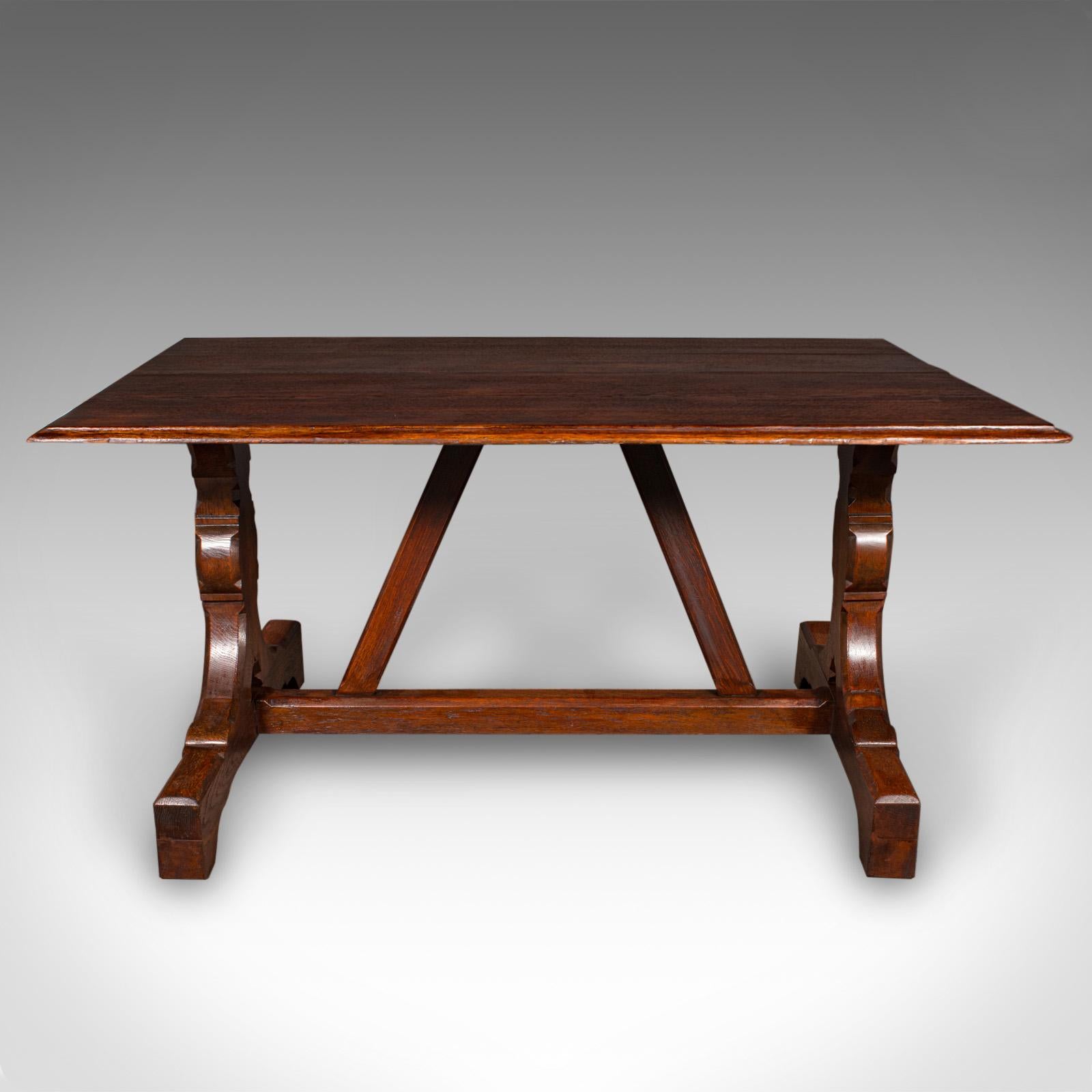 Our Stock # 25531

This is an antique six seat country kitchen dining table. An English, oak ecclesiastical or farmhouse table in Gothic revival taste, dating to the late Victorian period, circa 1880.

Traditional Victorian refectory table with