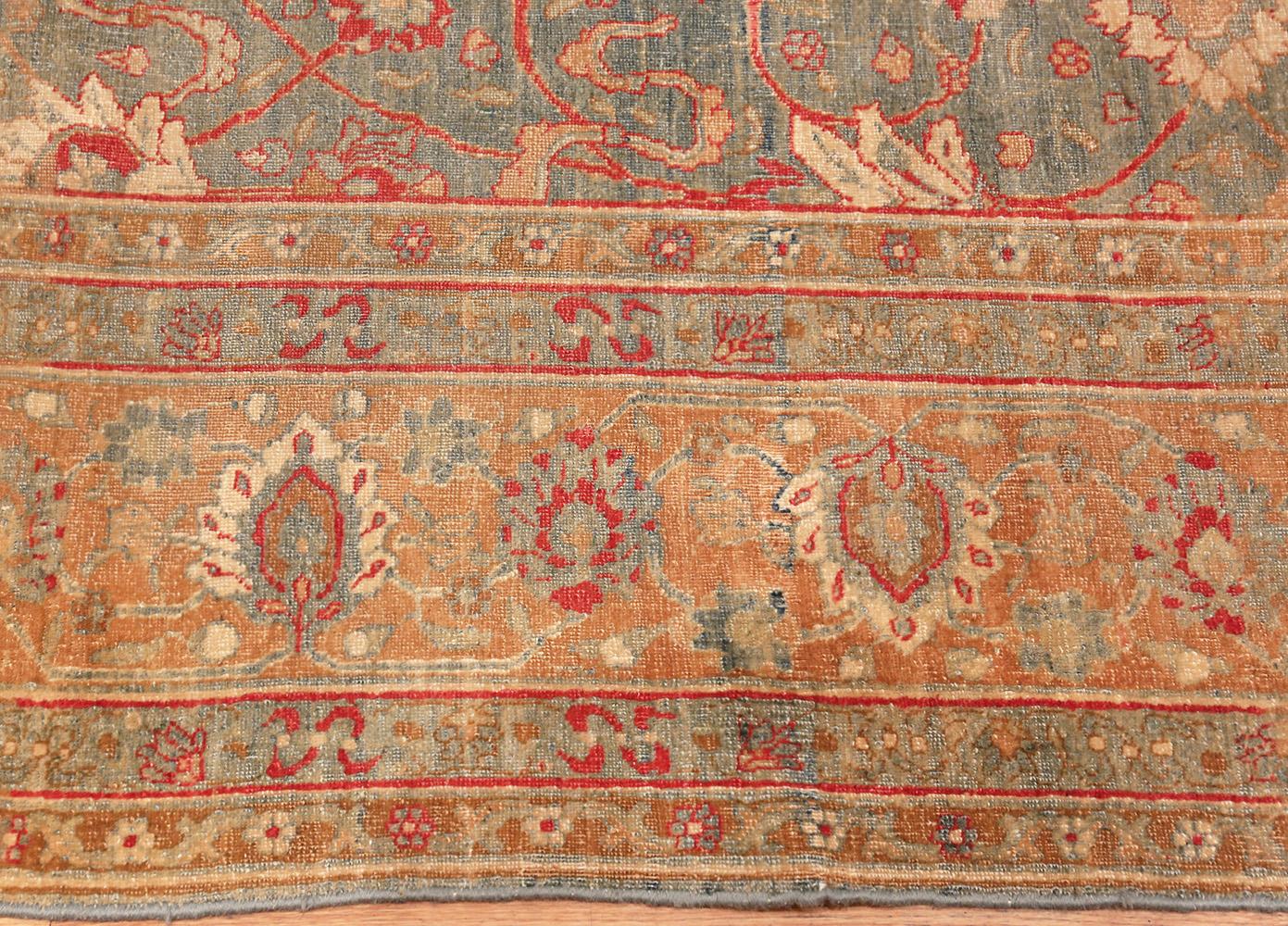 A magnificently sophisticated antique sky blue color background Persian Tabriz rug, country of origin / Rug type: Antique Persian rugs, circa 1910.