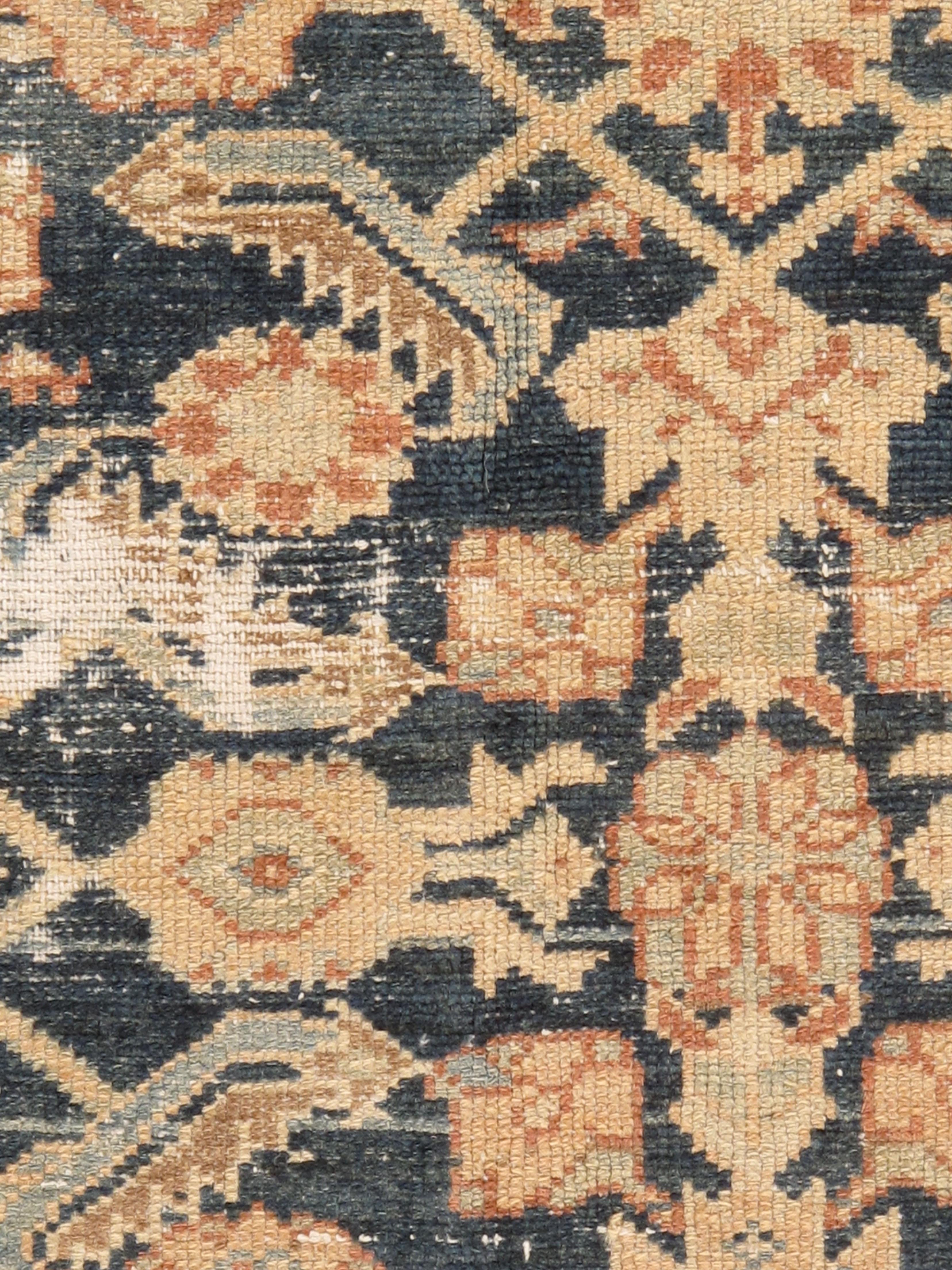 Antique slightly distressed Persian Malayer rug, circa 1900. A lovely antique Malayer handwoven rug with blues and an abrash in soft gray. Abrash is a natural change in color that occurs when different dyes are used in a batch of wool and gives