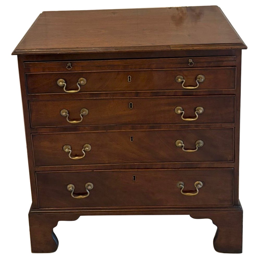 Antique Small Georgian Mahogany Four Drawer Chest of Drawers with Brushing Slide