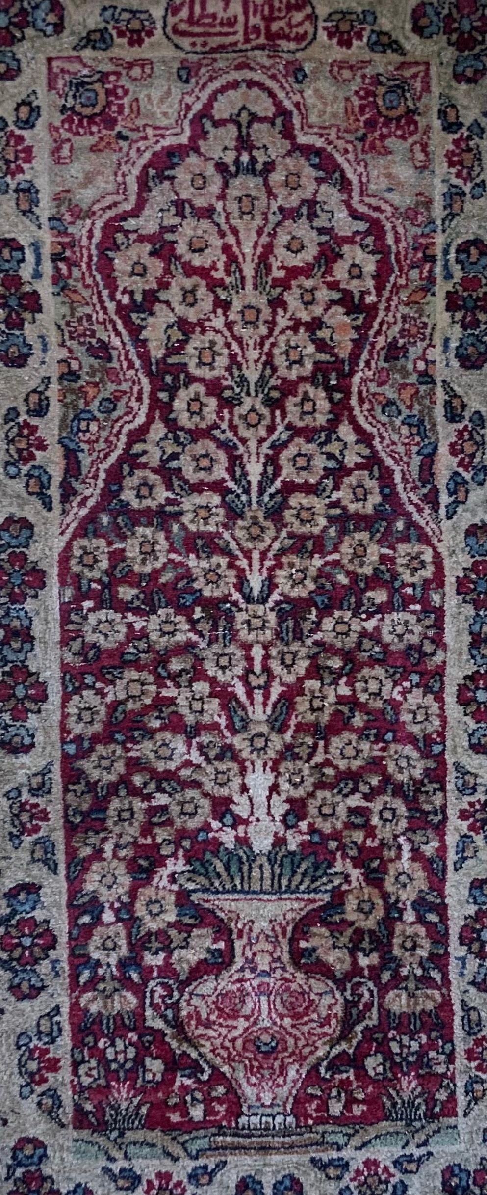 Small rug hand woven of cotton and wool, exceptional vase and flowers design, and signature of the artist weaver on the top. Could use as small floor rug, or as hanging wall tapestry. The rug was professionally hand wash before presented for