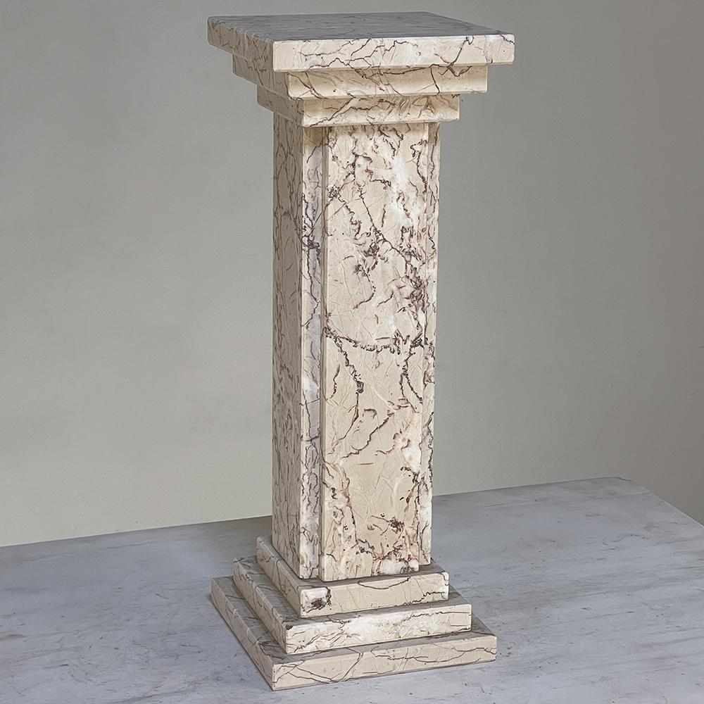 Antique small marble Neoclassical pedestal is the ideal choice for displaying a small sculpture, vase, or objet d'art. It's also a good choice as a riser atop another surface like a mantel, buffet or counter. Crafted from solid marble, it will