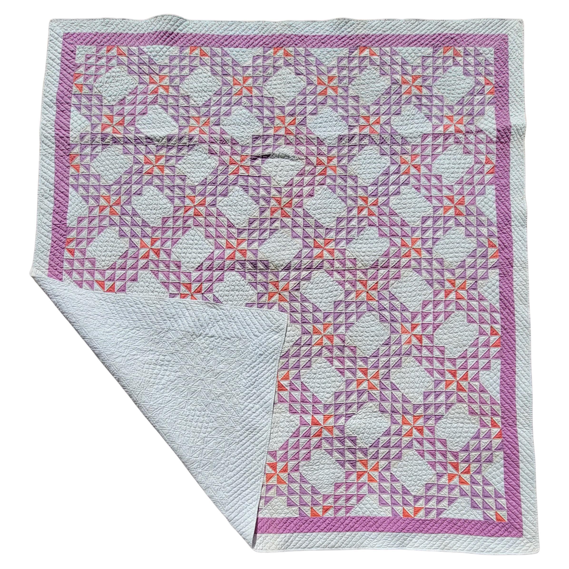 1920's Antique small piece Ocean waves quilt. Hand quilted in pastel lavender and pink. Pristine condition.