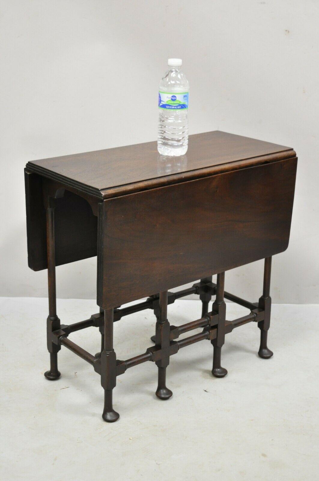 Antique small salesman sample mahogany drop leaf gate leg queen anne table. Item features unique small size, solid mahogany construction, gate legs, drop leaves, beautiful wood grain, very nice antique item. Circa Early to Mid 1900s.
Measurements: