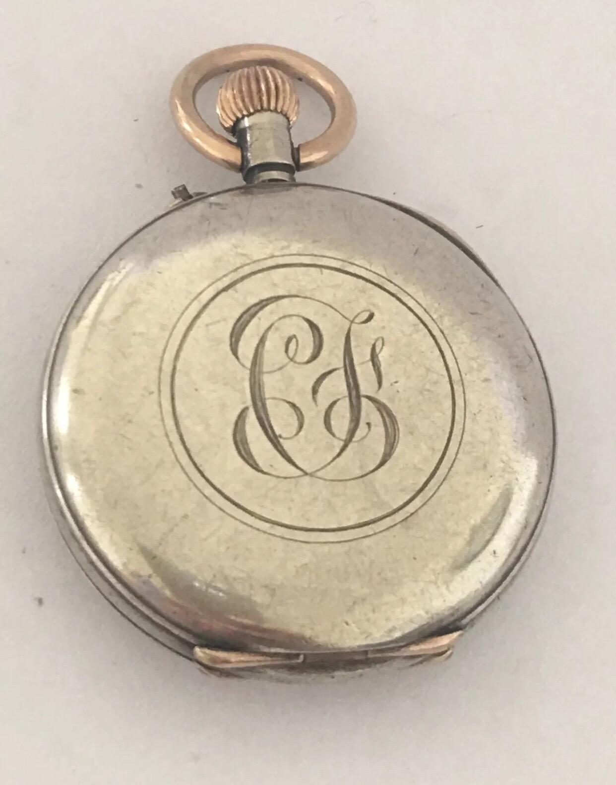Antique Small Silver Half Hunter Pocket Watch.


This watch is working and ticking well. The glass on front case cover is missing. Visible sign of wear and tear on the watch case as shown on the photos