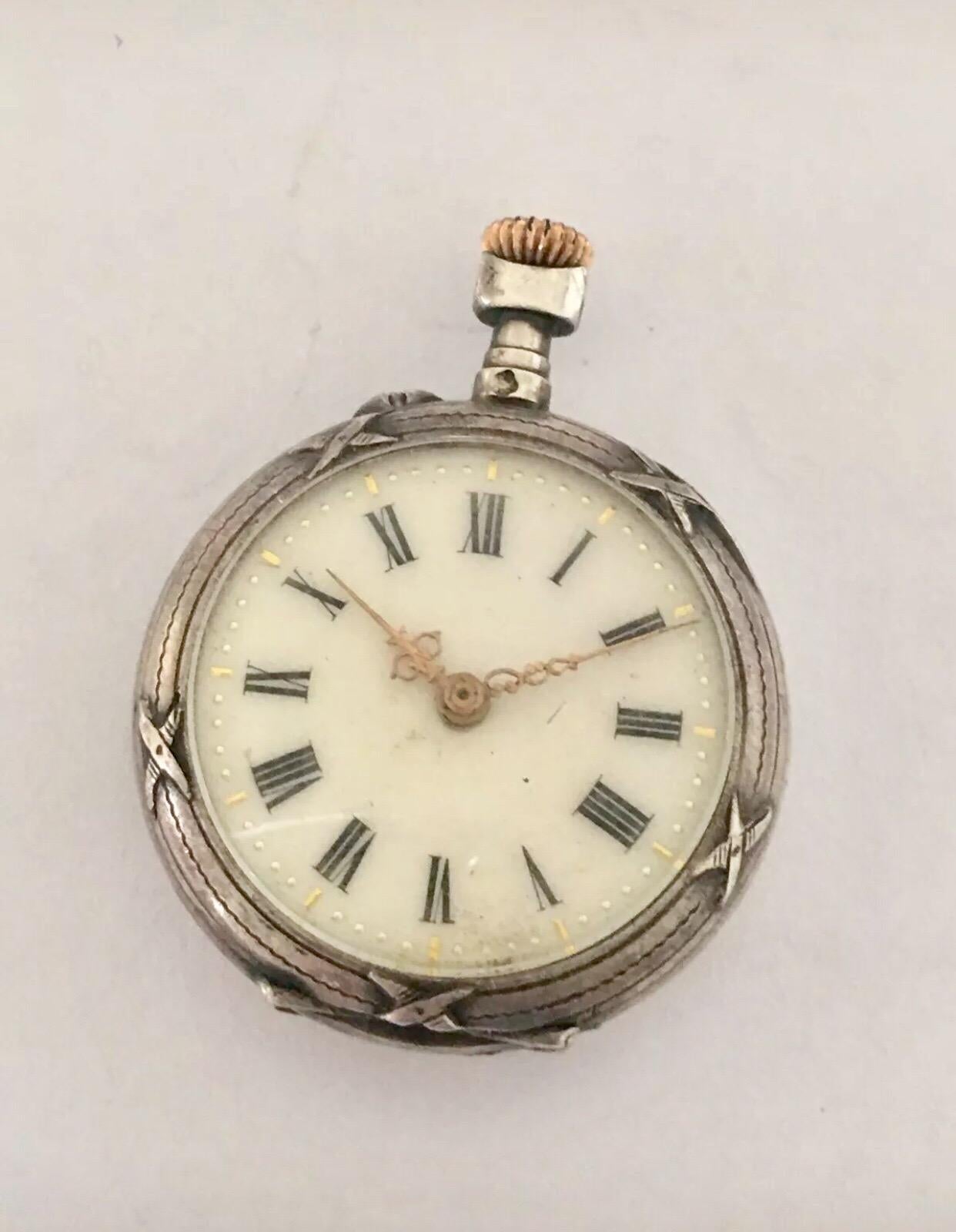 
Antique Small Silver Pocket / Fob watch


This beautifully engraved silver fob watch is working and ticking well. The loop or metal ring on top of the stem is missing.