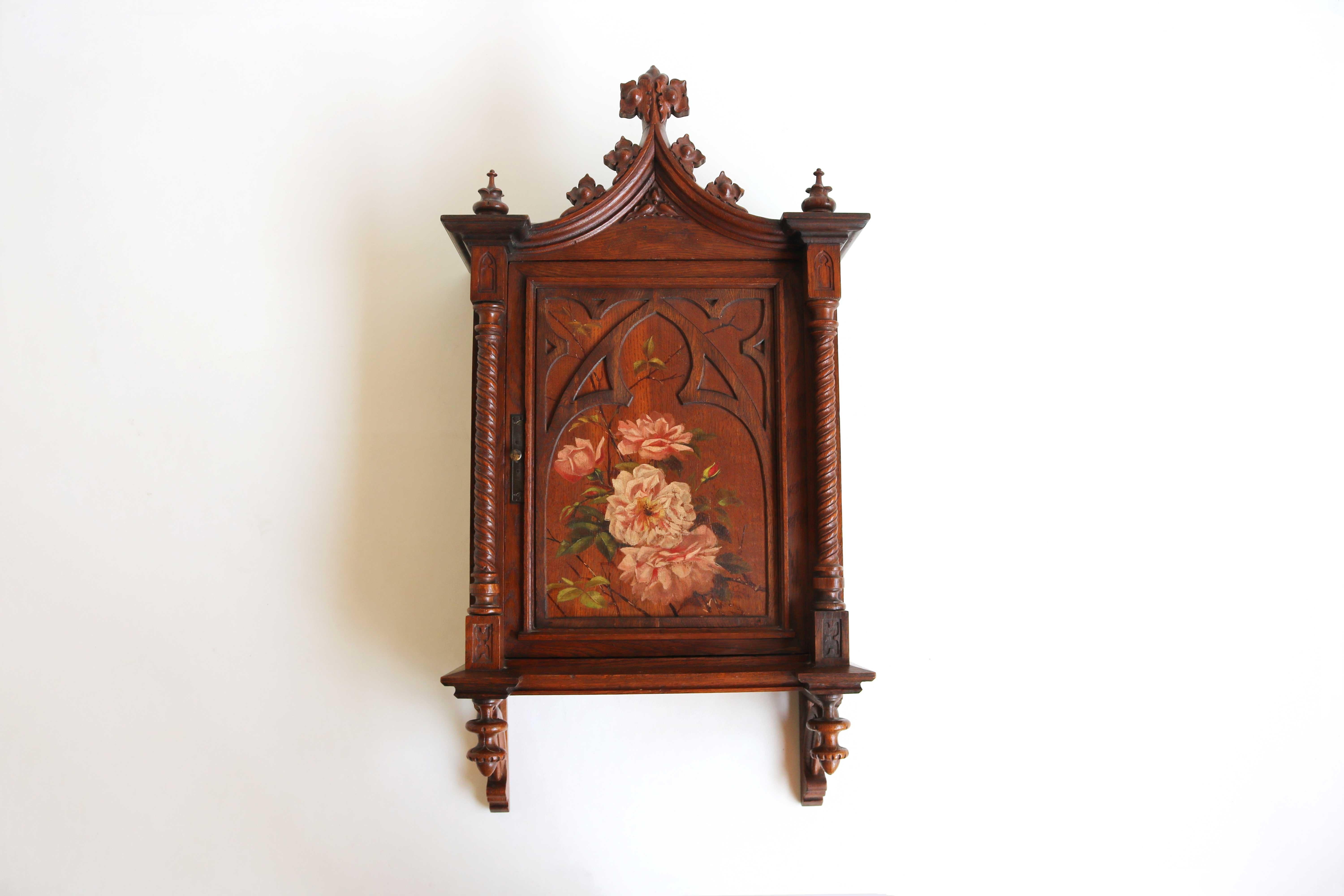 Antique Wooden Carved Hand Painted Neo-Gothic Small Wall Cabinet France 19th Century Pediment Twisted Medicine Cabinet Gothic Revival

Truly a beautiful rare and stunning antique hanging cabinet. 
Late antique 19th-century French gothic style