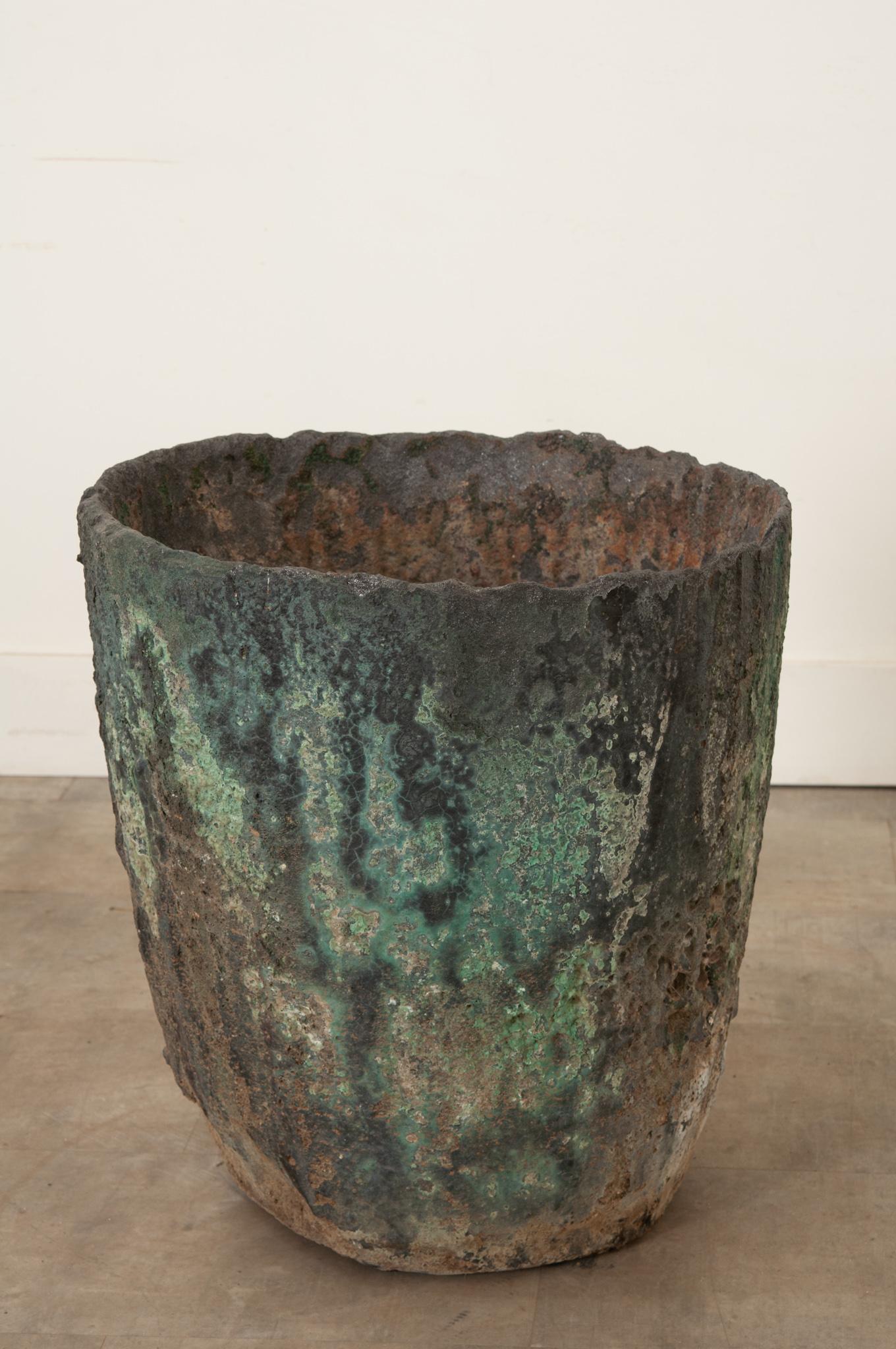 This large antique smelting pot was used for glass blowing and is a great example of Industrial art. It is an object that was made to serve a purpose that has turned into something amazing by Industrial processes and time. Its unique design and