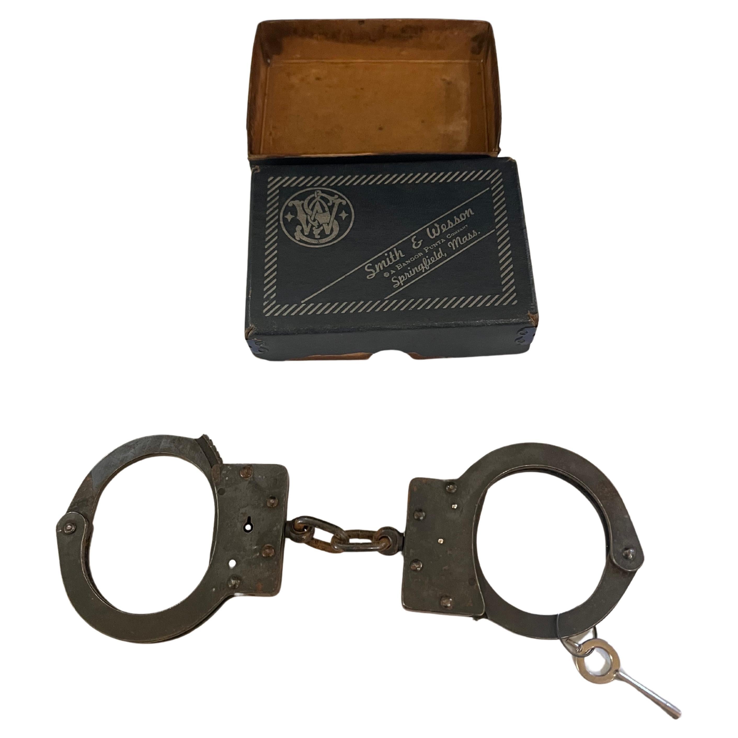 A very rare and collectible art Deco pair of handcuffs model 926, in its original box hard to find item.