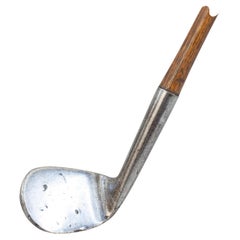 Antique Smooth Face Rut Niblick Golf Club.