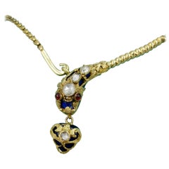 Antike Schlangenhalskette aus 14 Karat Gold mit Diamanten im Rosenschliff und blauer Emaille, Granat 1840