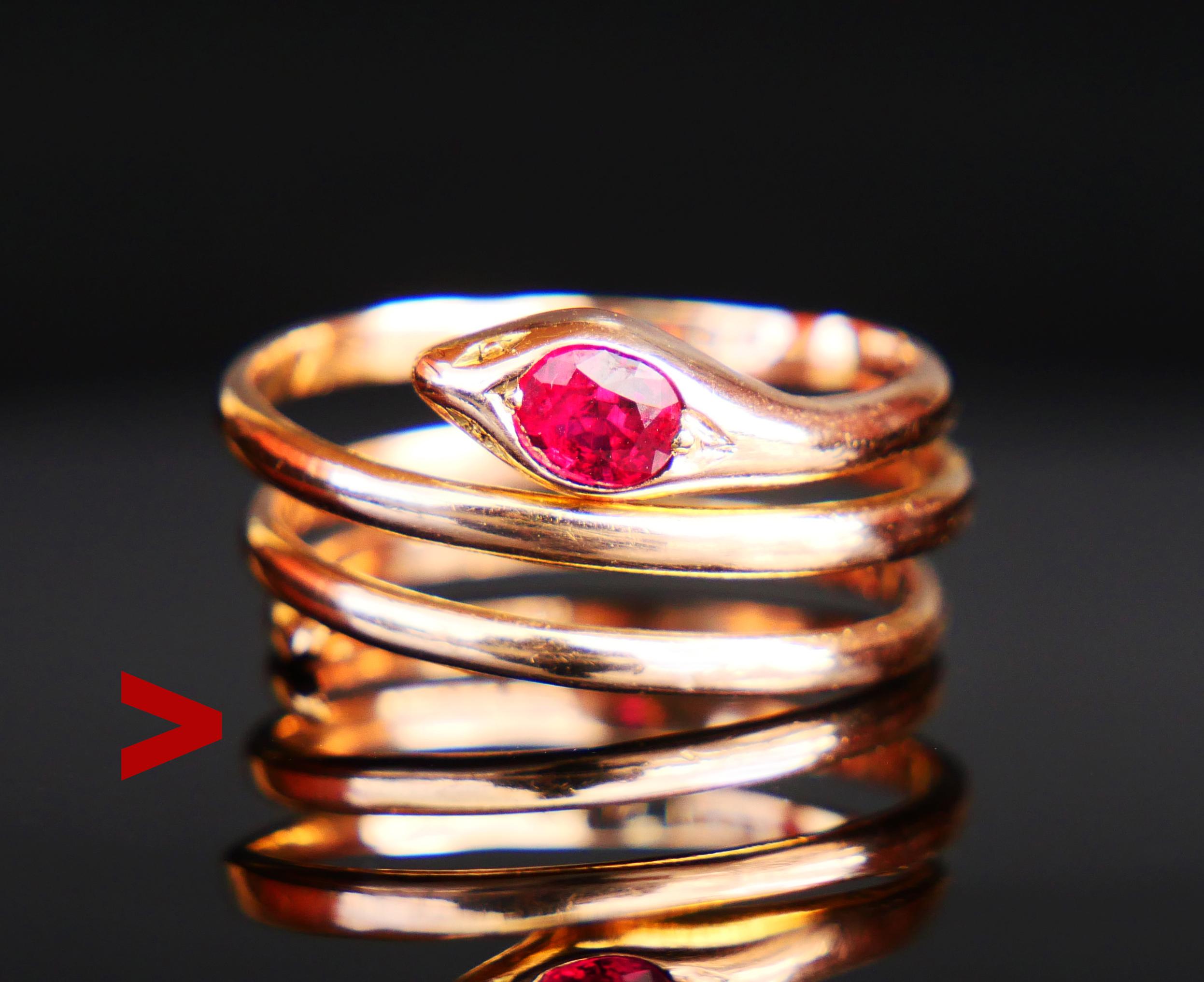 Antique Serpent Ring in solid 18K Orange Gold. Coiled body, head decorated with natural Ruby stone of fine quality measuring 5 mm x 4 mm x 2.9 mm deep / ca. 0.5ct.

This design is unisex and will look great both on Men or Women if the size is