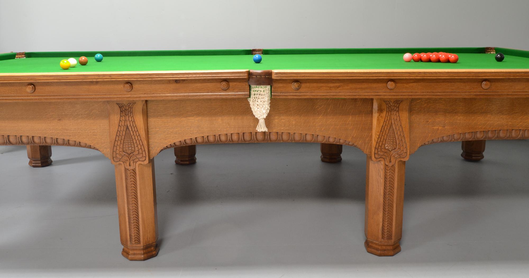 A beautiful solid oak Art Nouveau snooker or billiard table by Orme and Son circa 1901.

Standing on eight octagonal legs with superb geometric designs this table has great presence.

The timber quality throughout is the finest quarter sawn oak,