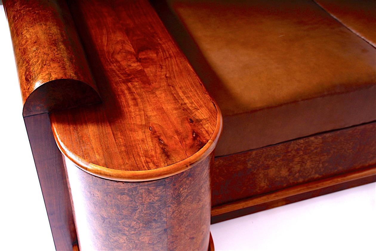 Beautiful sofa with glass bookshelf and hidden bar. Under the mattresses is storage space.The whole length of the sofa even with a bar is 255cm.