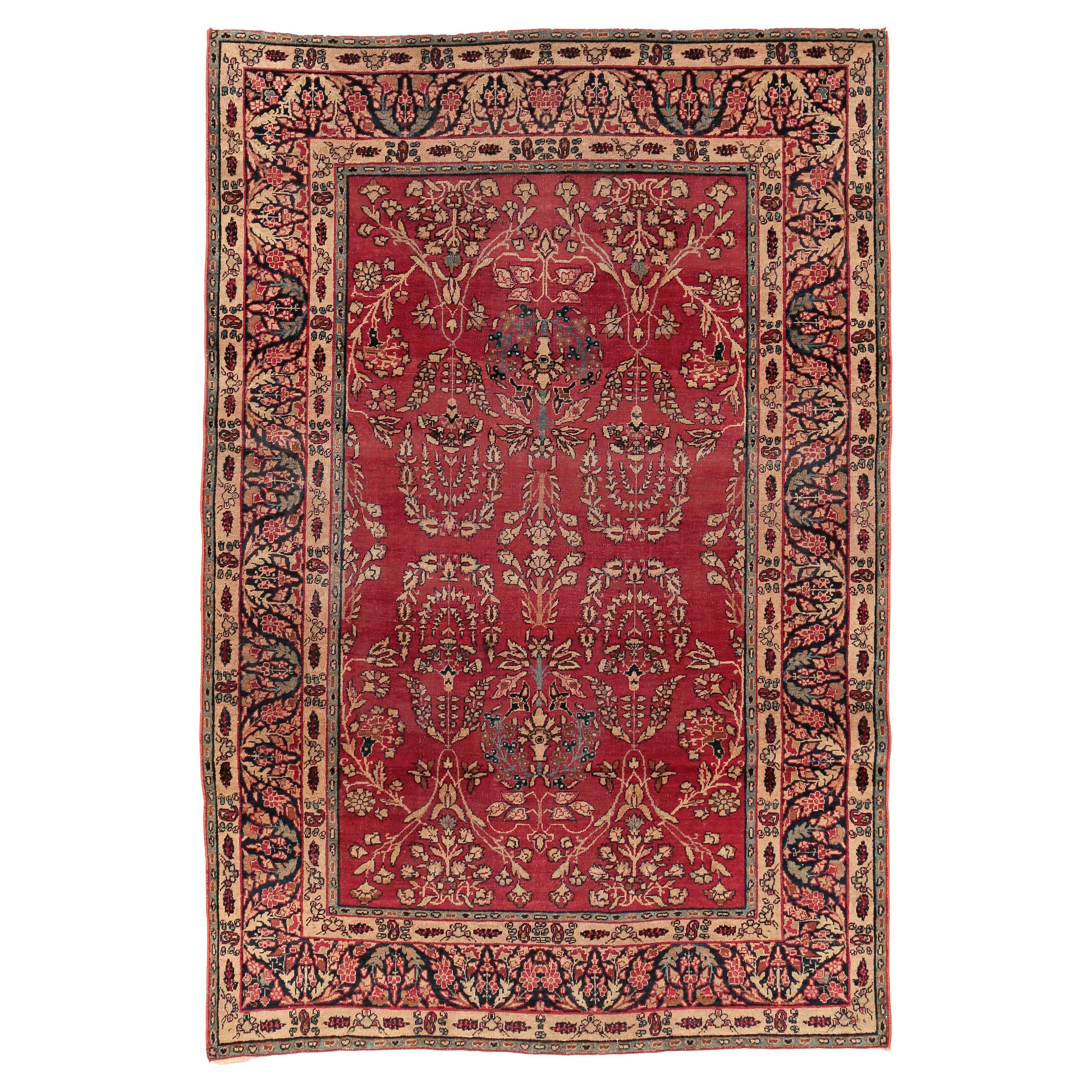 Alfombra antigua de Anatolia de color rojo suave con motivos botánicos en venta