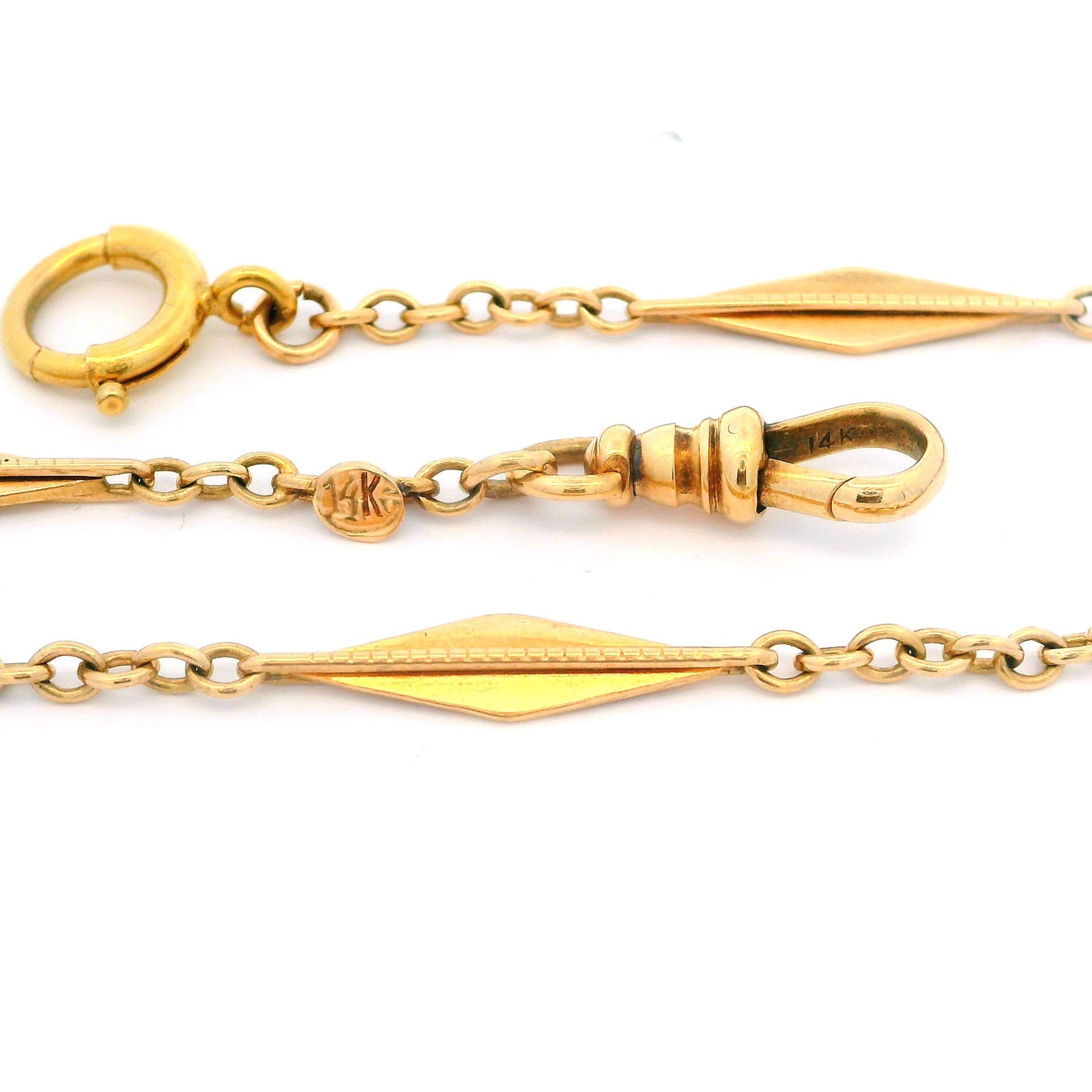 Material: Solid 14k Yellow Gold
Weight: 10.15 Grams
Chain Type: Flared Sections w/ Cable Links
Chain Length: 14 Inches
Chain Thickness: 1.9mm (at the flared links)
Chain Width: 4.4mm (at the open links)
Clasp: Spring Ring & Dog Clip
Inside Clasp