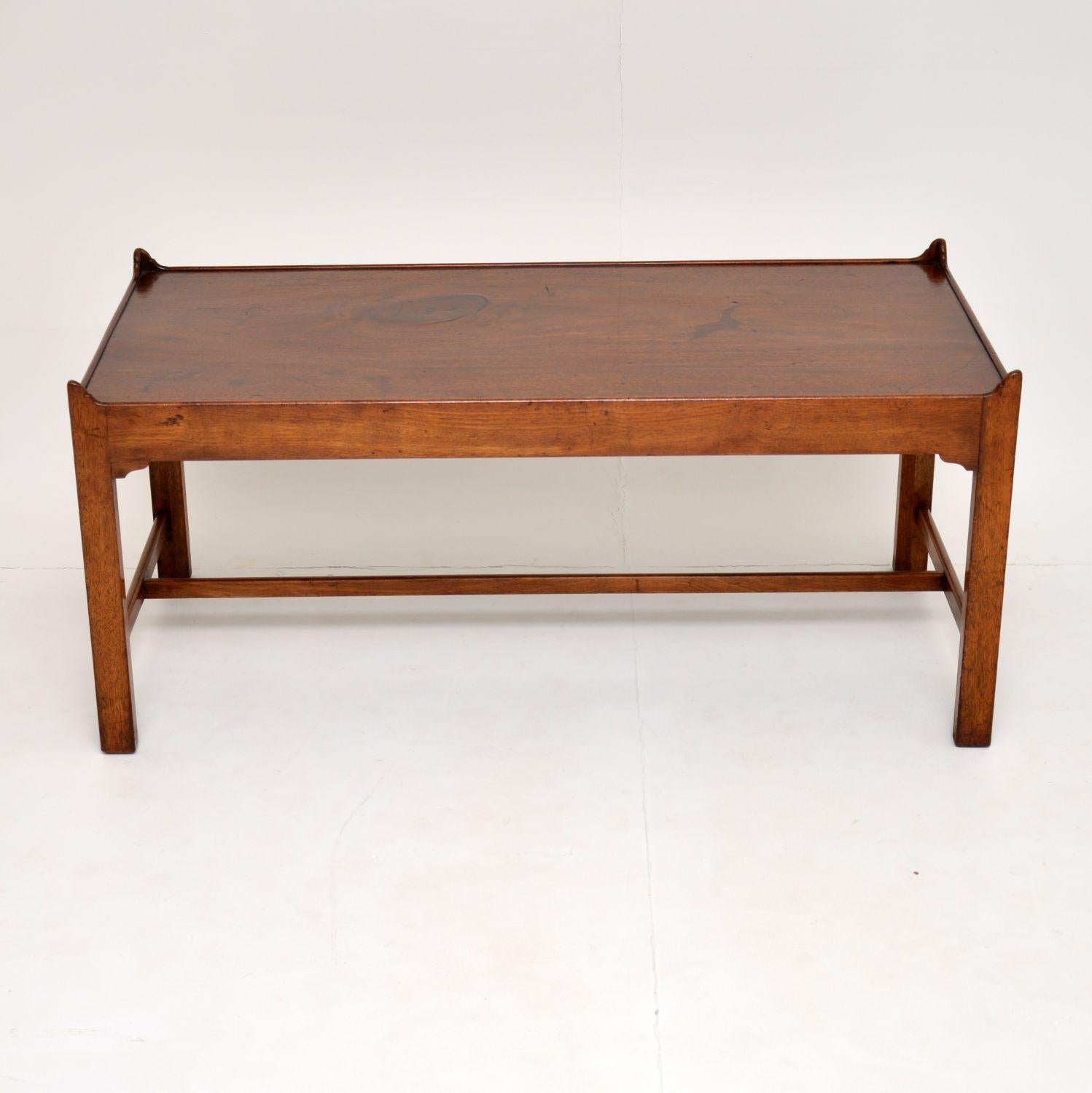 A beautiful and fine looking antique mahogany coffee table, this dates from circa 1900-1910 period.

It is unusual to find coffee tables of this design and age, it is extremely well made. We have had this French polished, it still retains a worn