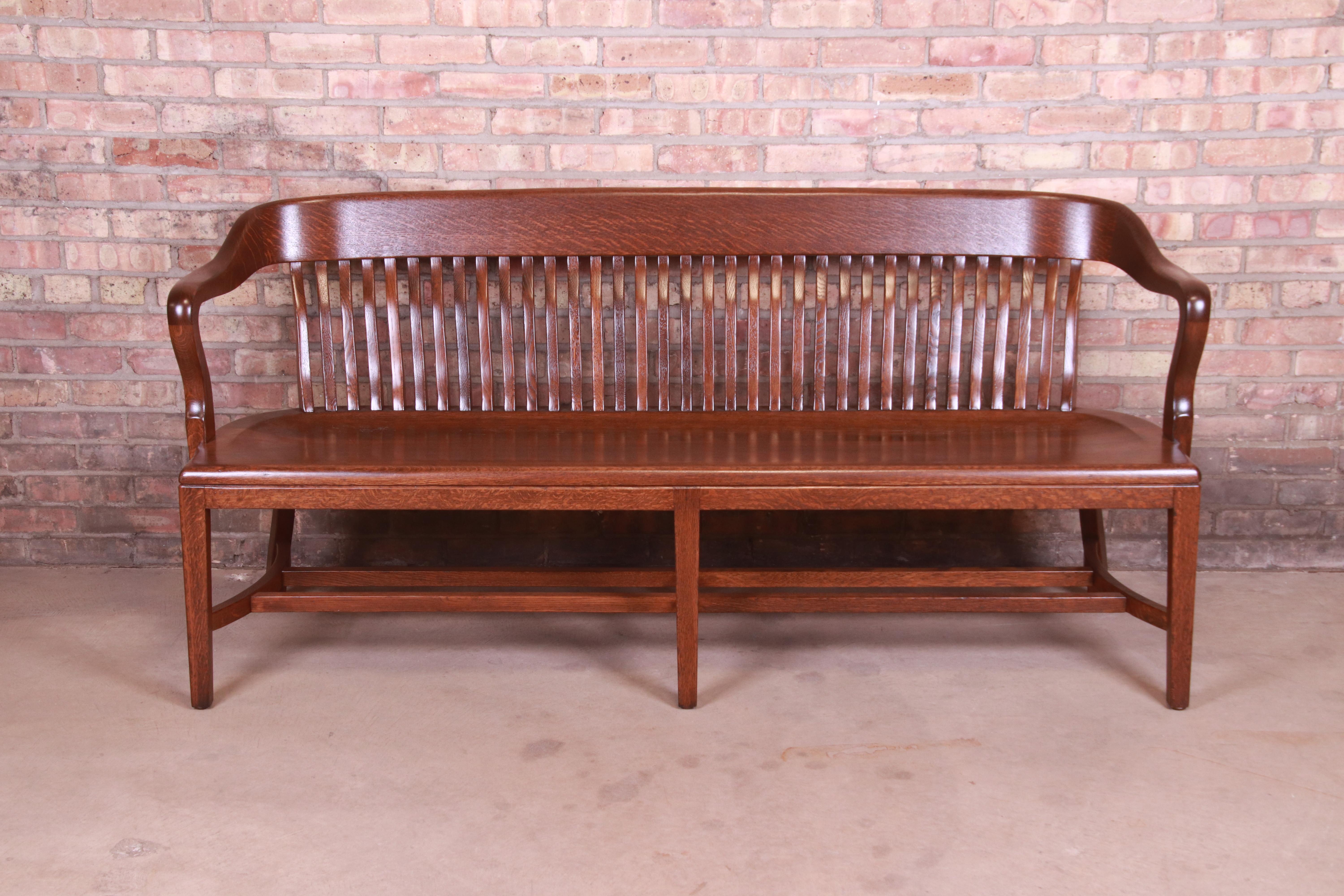 An exceptional solid oak banker or lawyer bench

By B.L. Marble Chair Co.

USA, Early 20th Century

Measures: 72