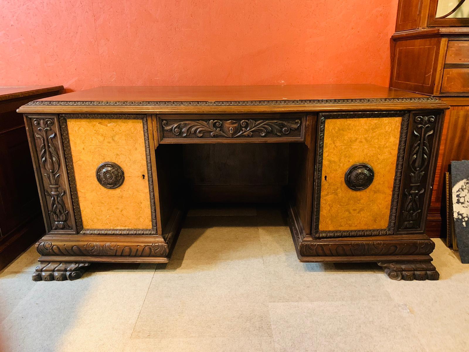 Antique desk with lion paws.
The furniture is very heavy and is made of walnut wood with beautiful inlays.
There are two doors and a drawer, the table cannot be dismantled.
The furniture is in very good condition.
  