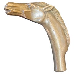 Ancienne canne à pommeau de cheval en laiton massif patiné