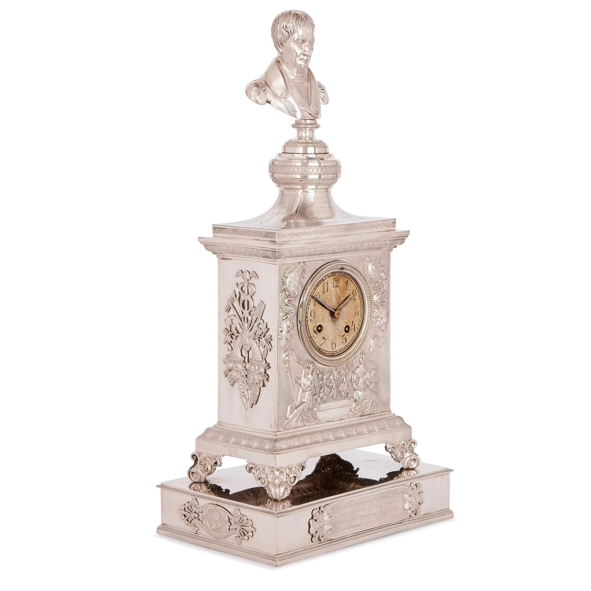 This charming silver mantel clock has a fascinating history, having probably been made as a commemorative item. It dates from the 19th century in Spain, and is the work of Spanish silversmith Jacinto Carreras (active 19th Century), who has produced