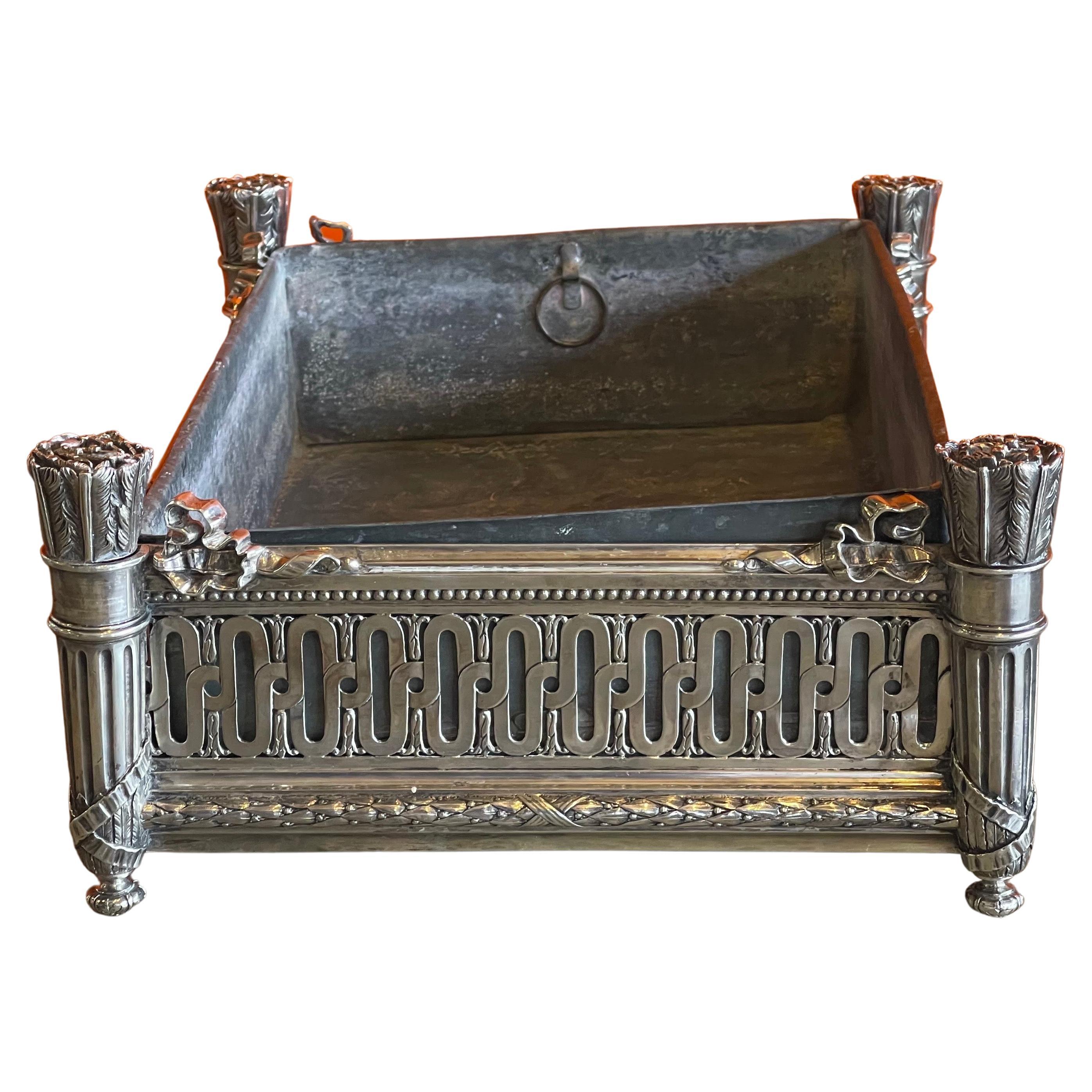 Large antique solid silver Napoleon III era jardinere / table top planter by Andre Aucoc, circa late 1800s. This gorgeous piece with a pierced gallery and four quiver legs includes the original lead insert pan. The piece measures 14.5