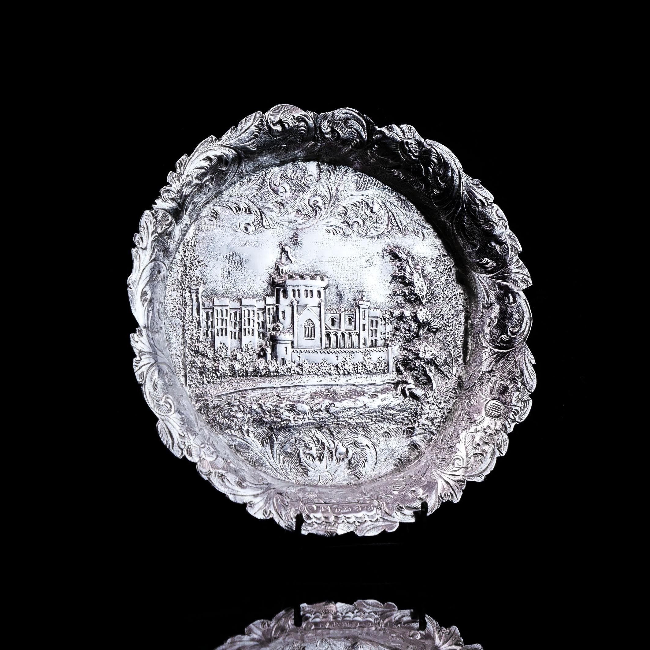 We are delighted to offer this intricate Victorian solid silver small dish/pin tray with the marks of Taylor & Perry, Birmingham 1843. 
 
Despite its dainty and compact size, this dish is all but plain and simple and a fine example of 'castle top'