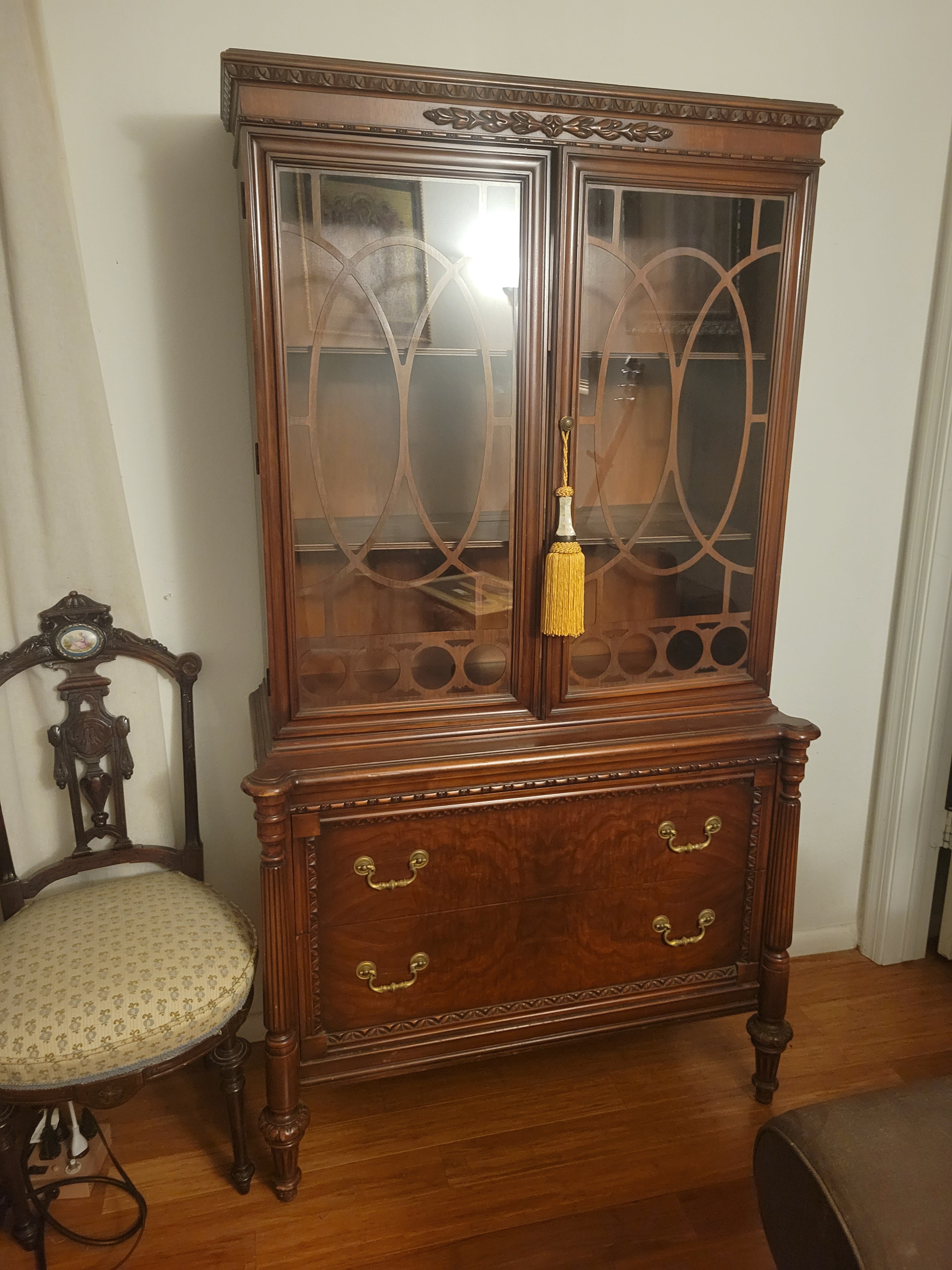 Antique hutch. Made out of high quality wood, most likely cherry. Once piece, the top does not separate. The hutch is 67.5