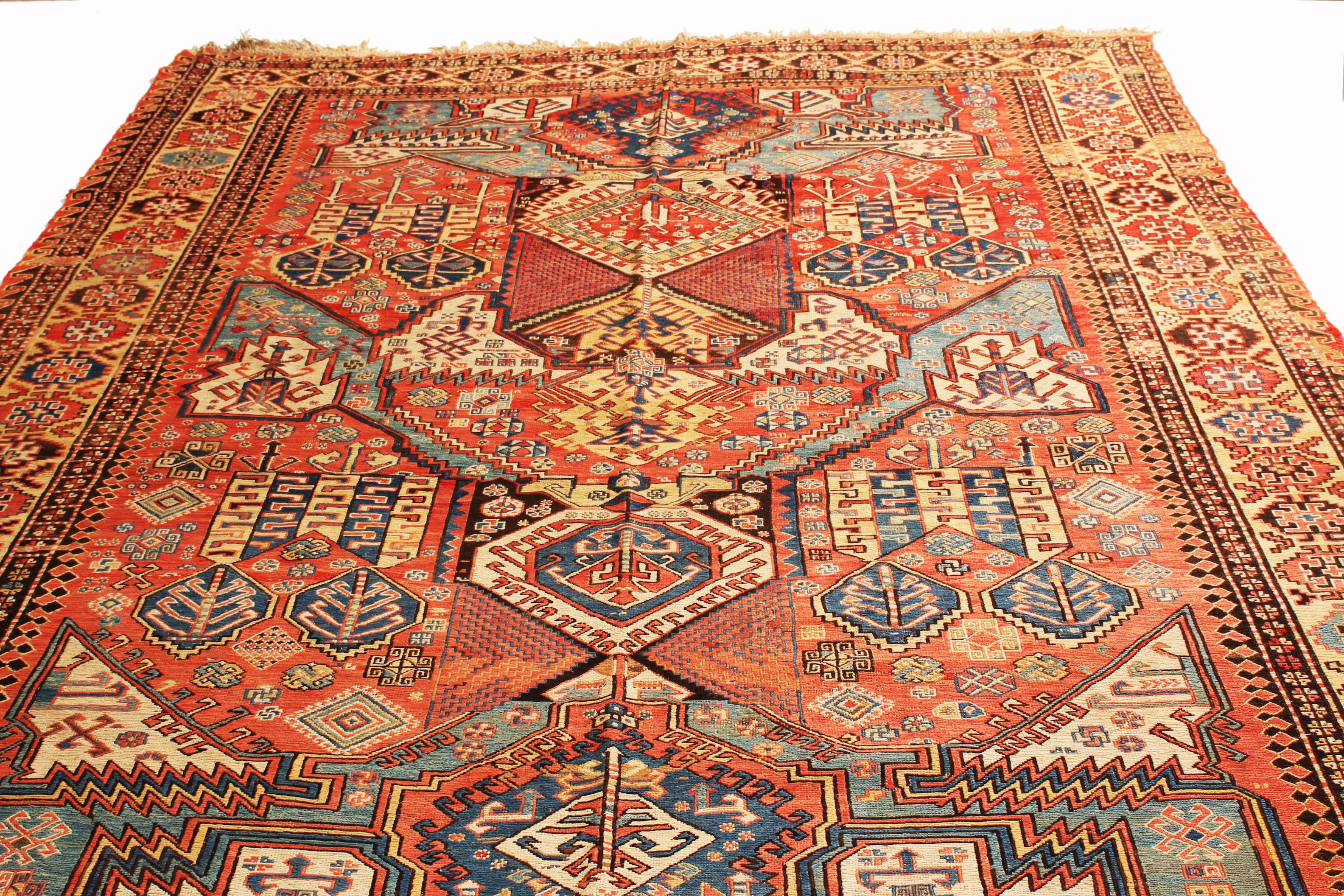 Originating from Russia between 1880-1900, this antique transitional Soumak wool rug hosts a variety of meaningful symbols representing protection, worship, warding, and strength. Hand knotted in high-quality wool with a pallet of rustic but bright