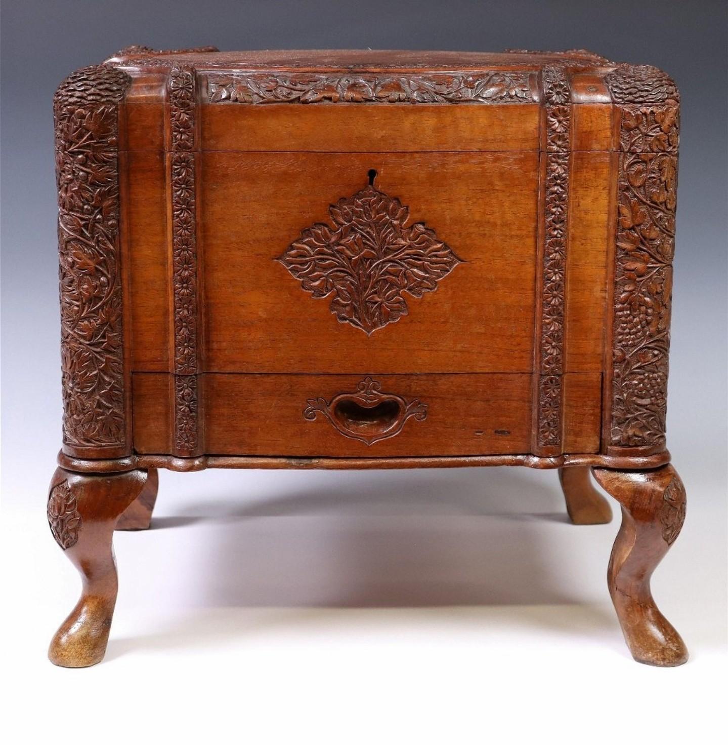 A scarce antique circa 1900 South Asian hand carved wooden decorative table box / jewel casket.

Hand-crafted in the early 20th century, likely British Ceylon (present day Sri Lanka) / Anglo-Indian (Colonial rule of India), featuring intricately