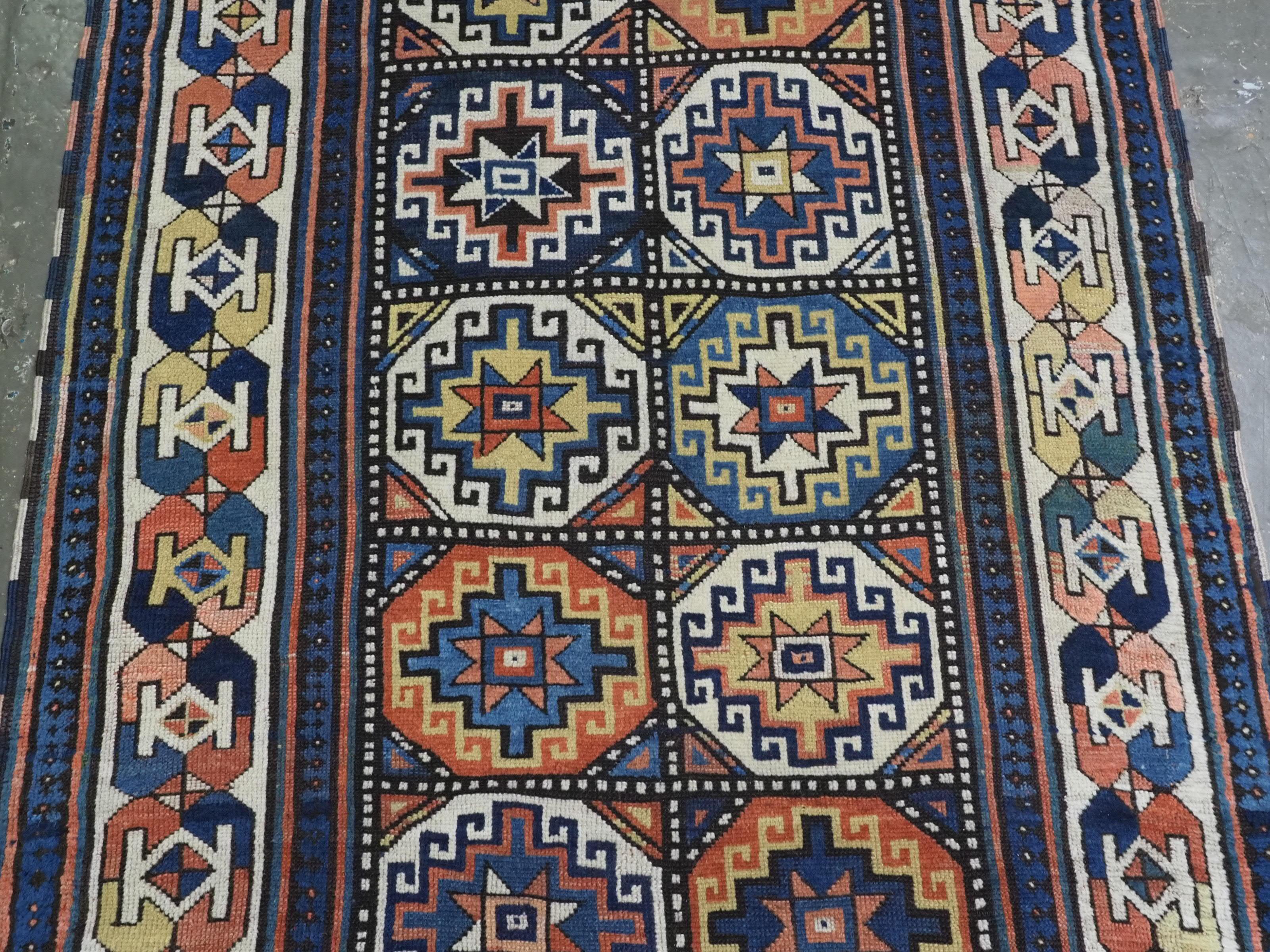 Late 19th Century Antique South Caucasian Moghan Kazak runner with Memling guls within octagons. For Sale