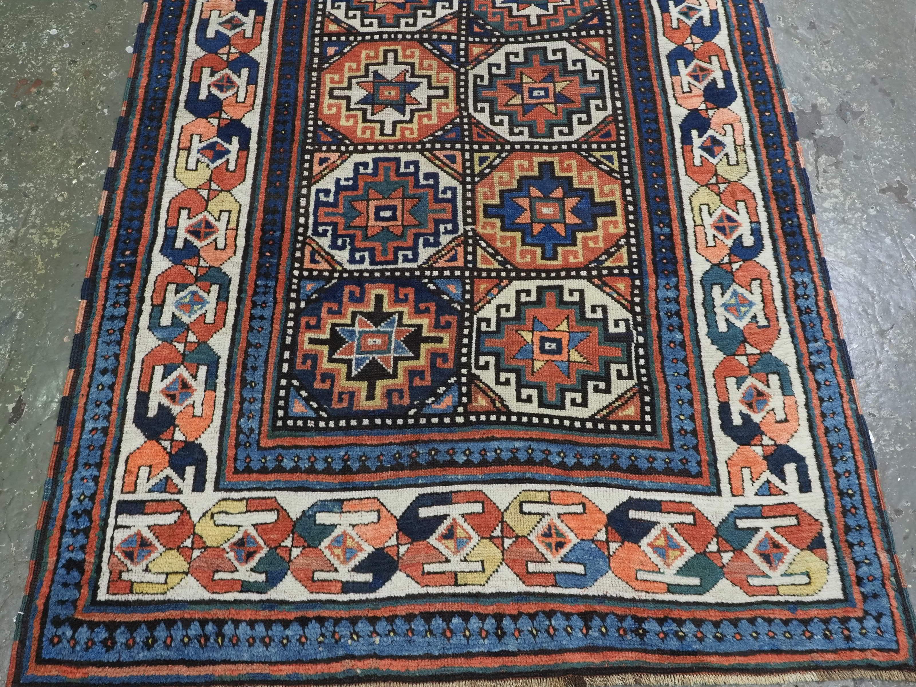 Antique South Caucasian Moghan Kazak runner with Memling guls within octagons. For Sale 1