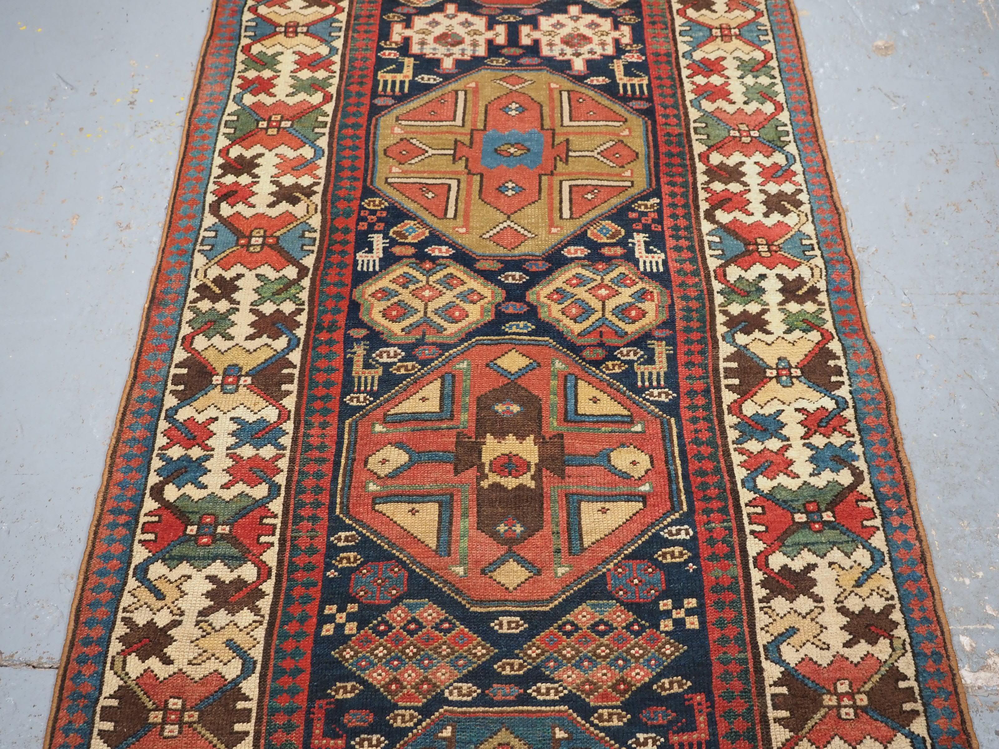 Late 19th Century Antique south Caucasian or Kurdish runner of superb design and colour. For Sale