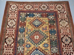 Antique South Caucasian rug with scarce yellow ground.  Circa 1880.